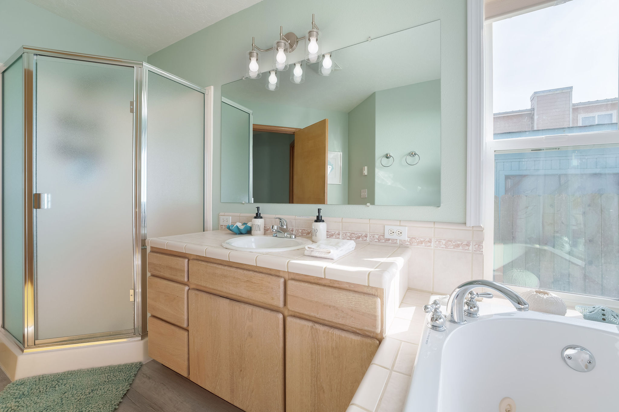 Pamper yourself with our premium bath amenities and serene bathroom ambiance.