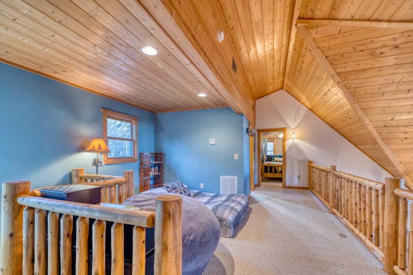 Another upstairs bedroom, providing a view of the adjacent room.