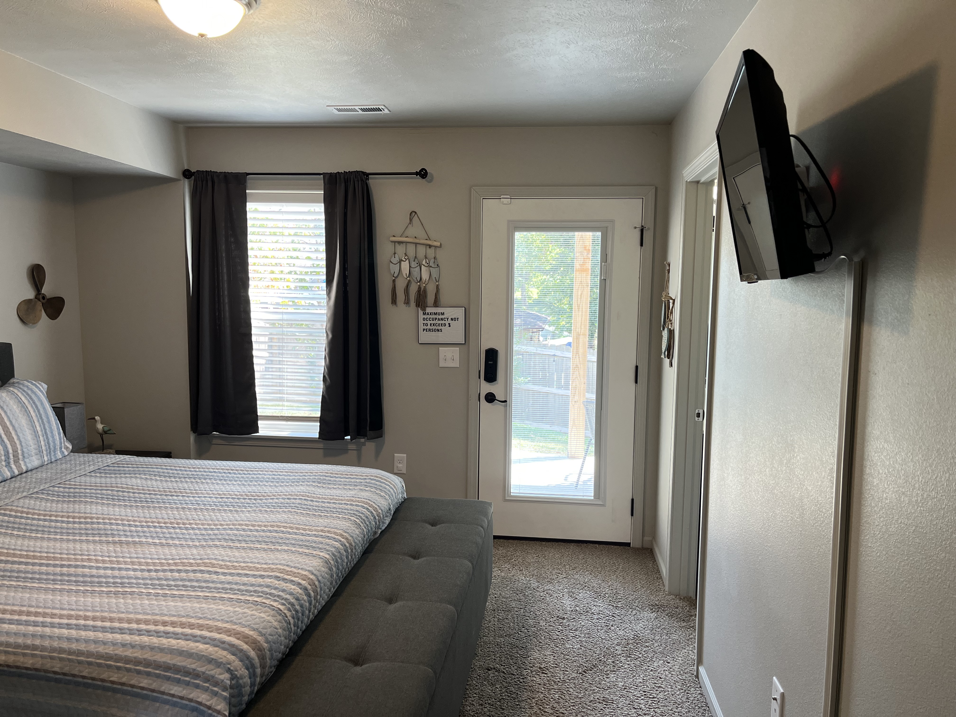 Master Bedroom has plenty of light and access to backyard patio for morning coffee