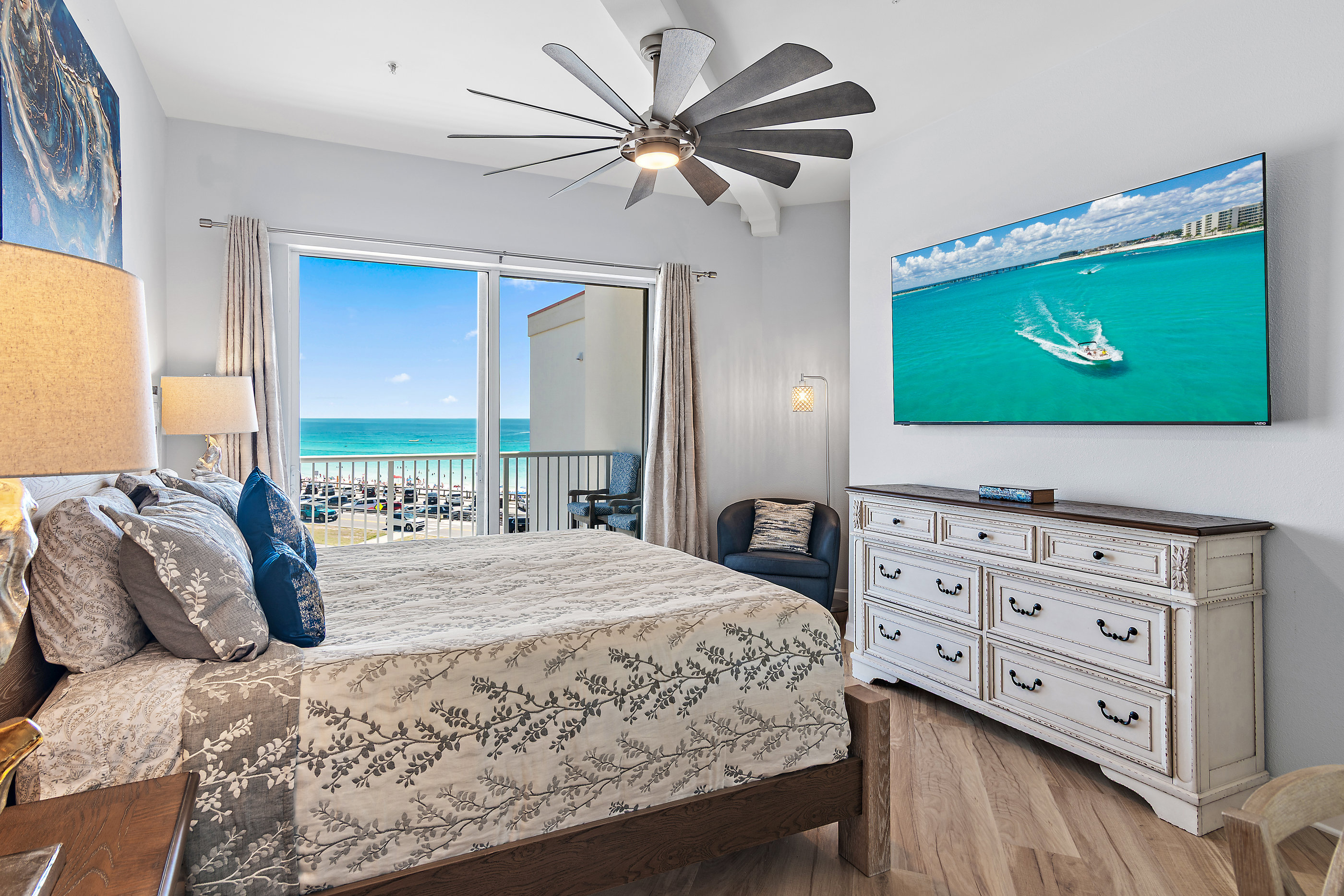 Gulf‑front master king bedroom with balcony access