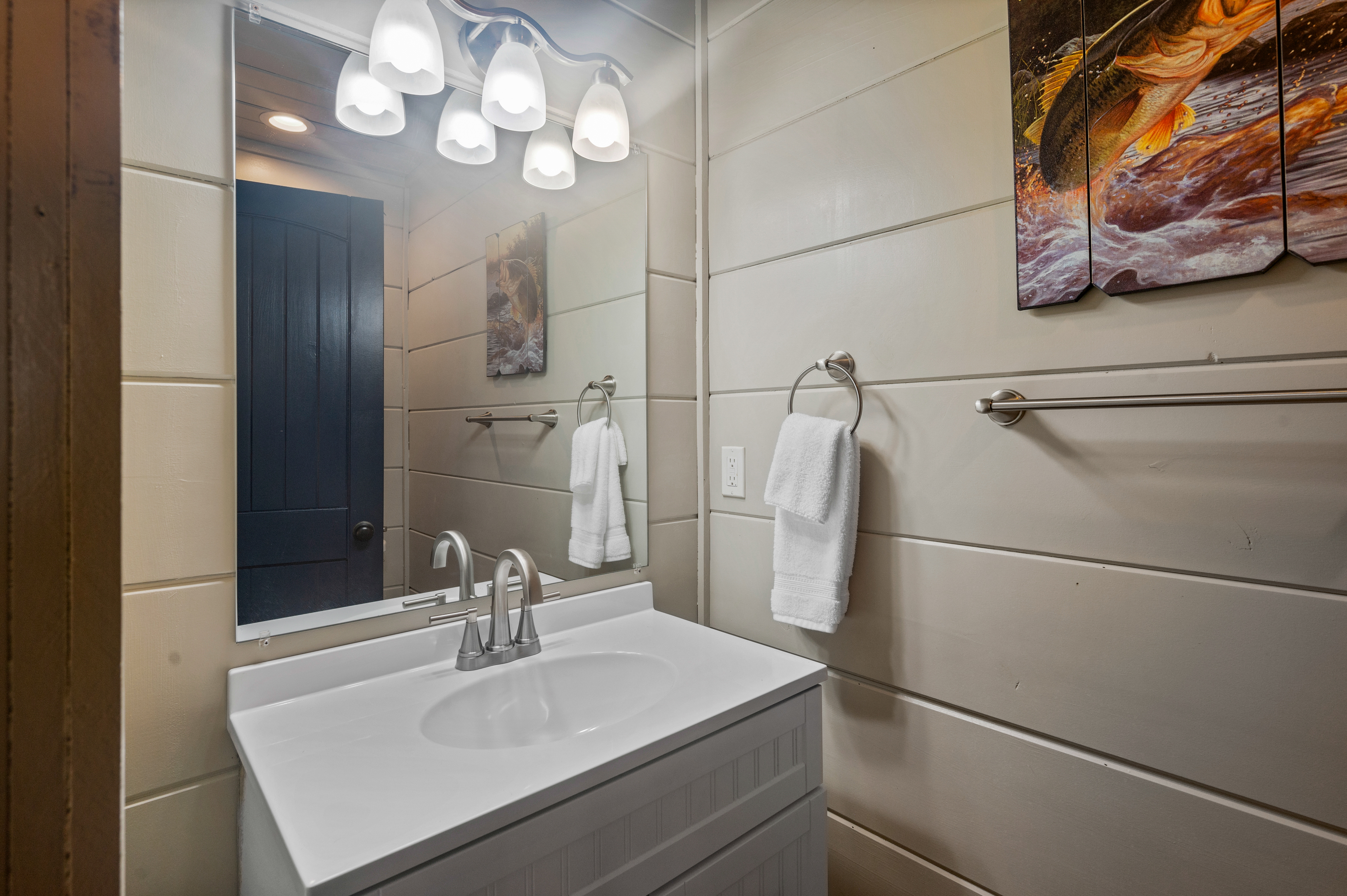 Pool room has a private powder room.
