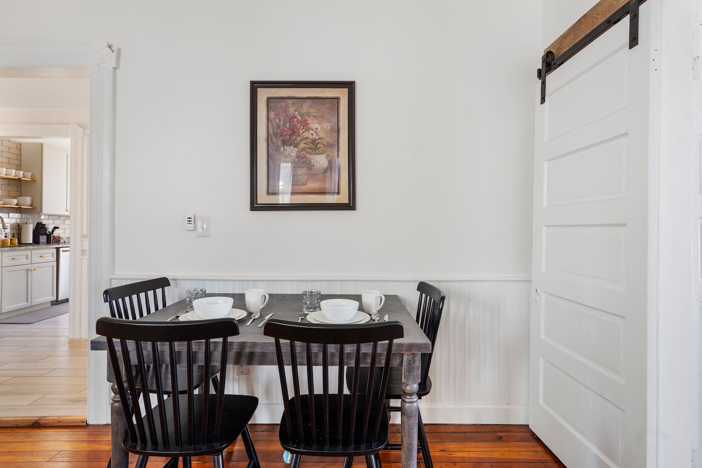 Dining area open to the kitchen — ideal for a home-cooked meal after exploring Wilmington