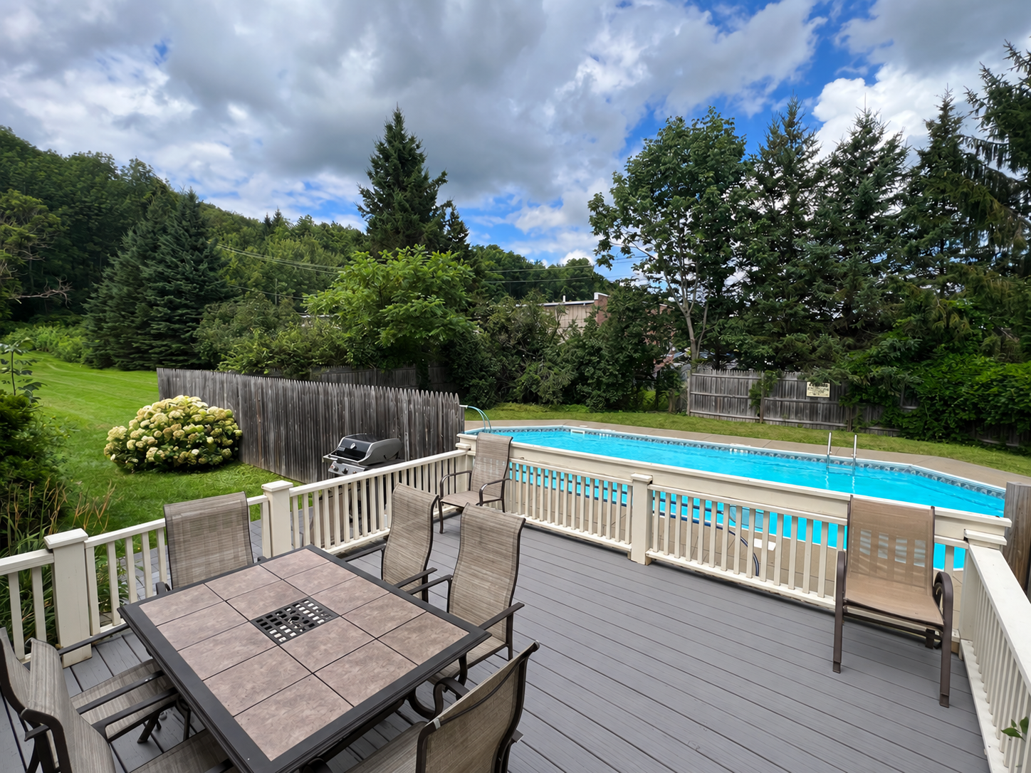 The Federal House side deck off kitchen leading to grill area and pool.