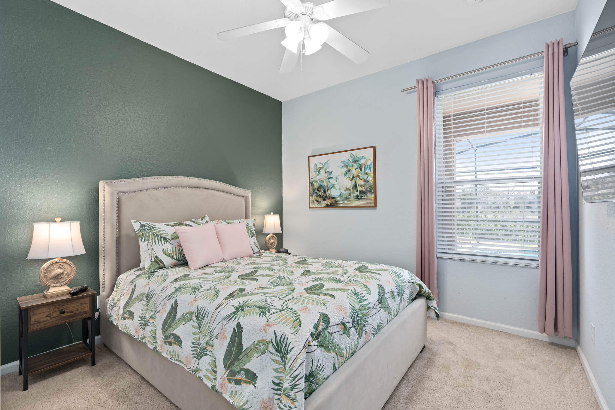 Downstairs queen bedroom with 55" TV - Now with luxury vinyl flooring!