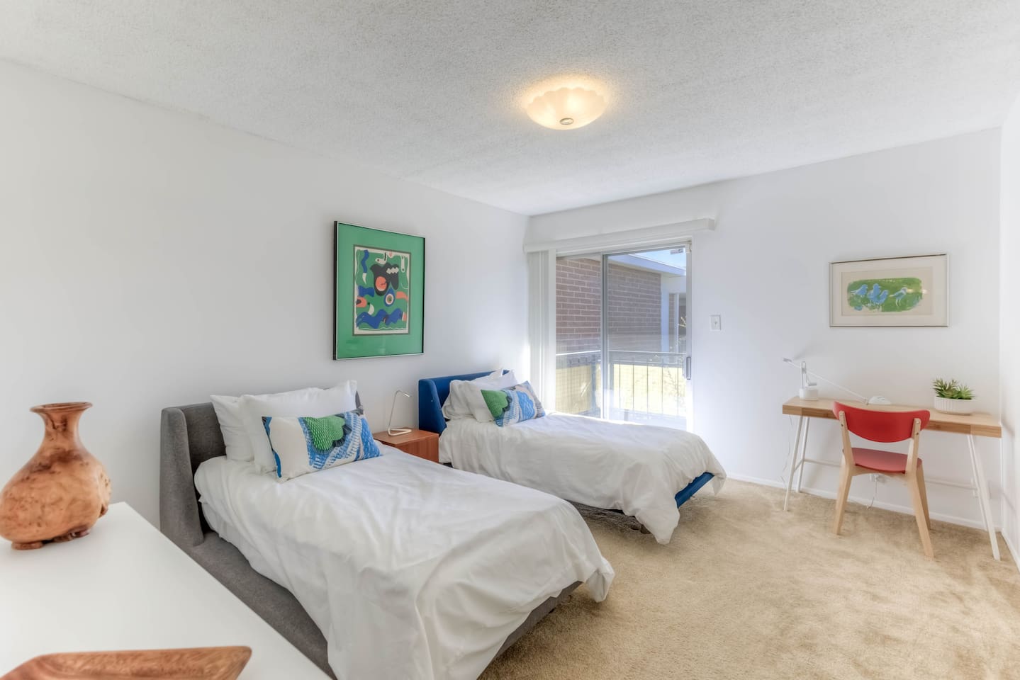 2 twin beds, slider to balcony, room darkening shades, desk