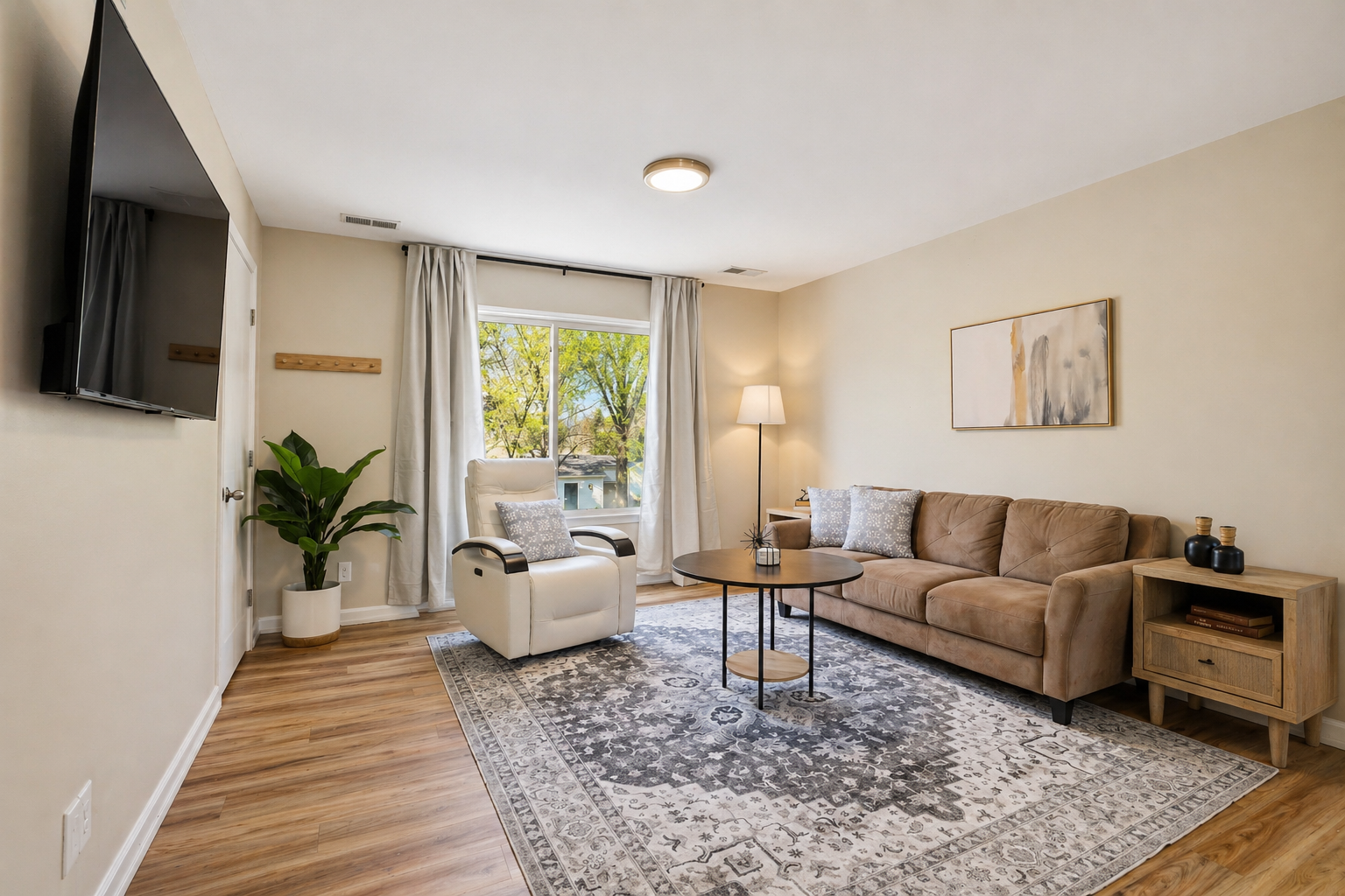 Warm and inviting, our living room is the heart of your stay.