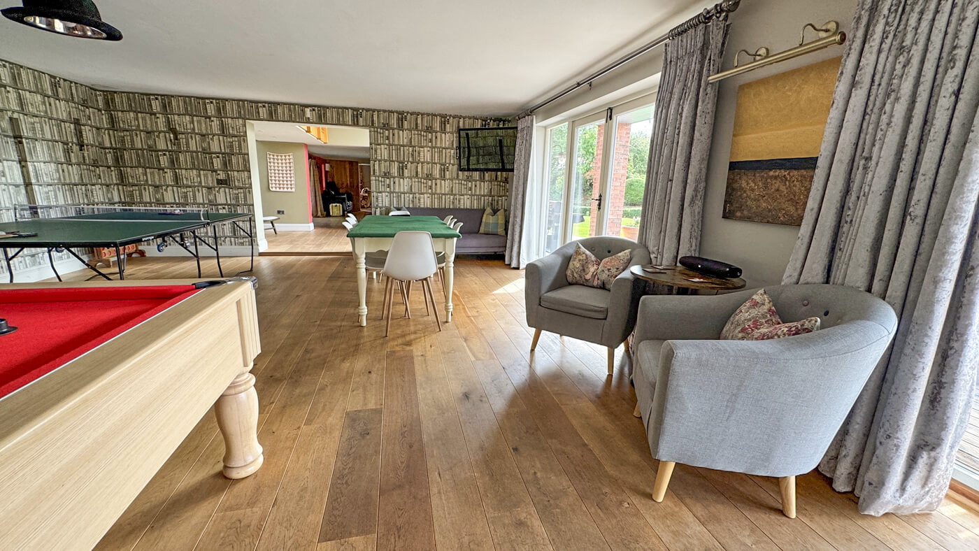 Games room additional seating and doors to garden