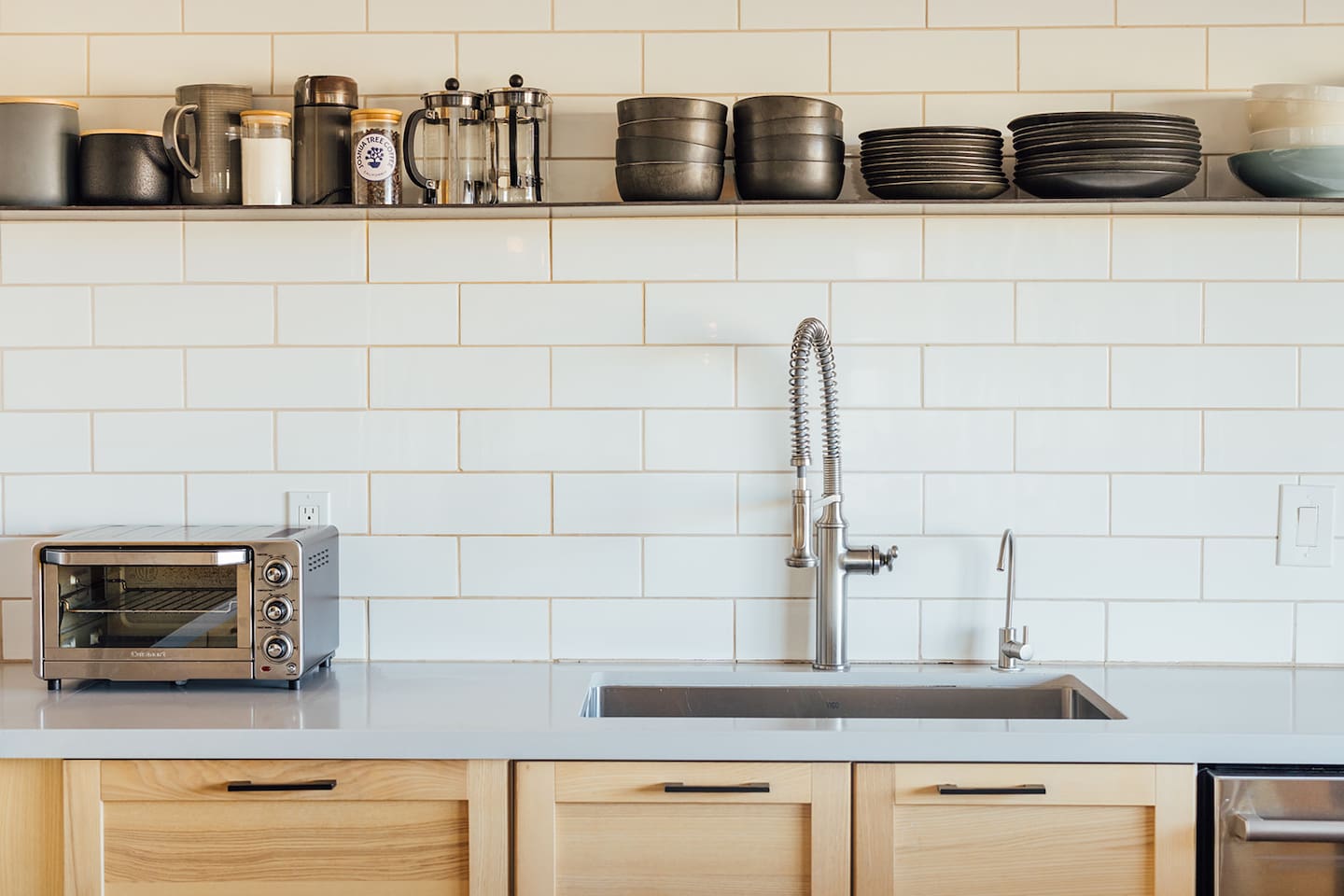 Cooking and gatherings made easy with all you need: two cast iron pans, baking dishes, stainless steal pots and pans + nonstick pots and pans.