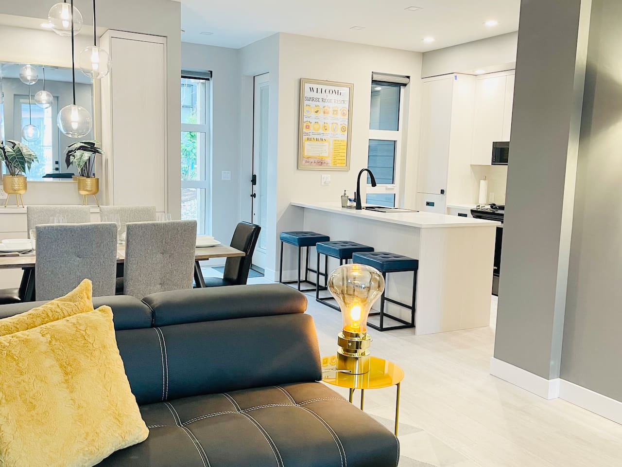 View from Living room into the Dining area and Kitchen. 