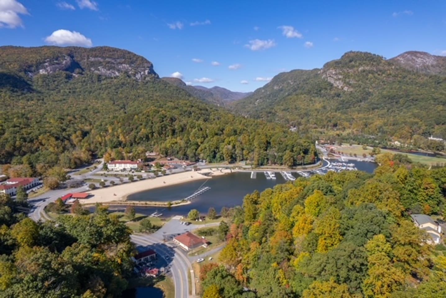 Drone footage/pictures of home and the surrounding area 
Pictured is Lake Lure Beach, Marina, Lake Lure Inn and Spa!