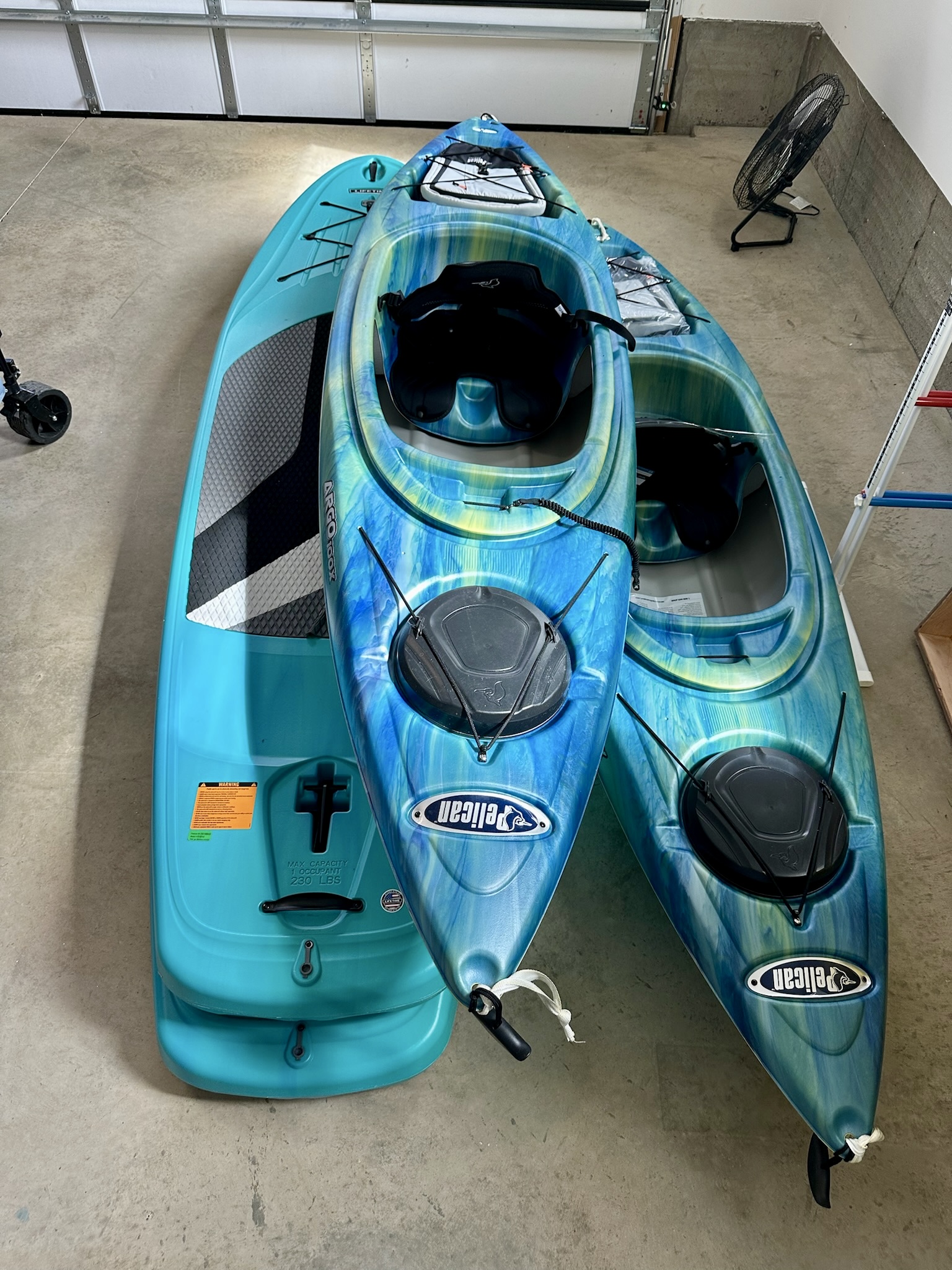 Paddle out and explore! Multiple kayaks and a paddleboard are provided so everyone can enjoy the lake together.