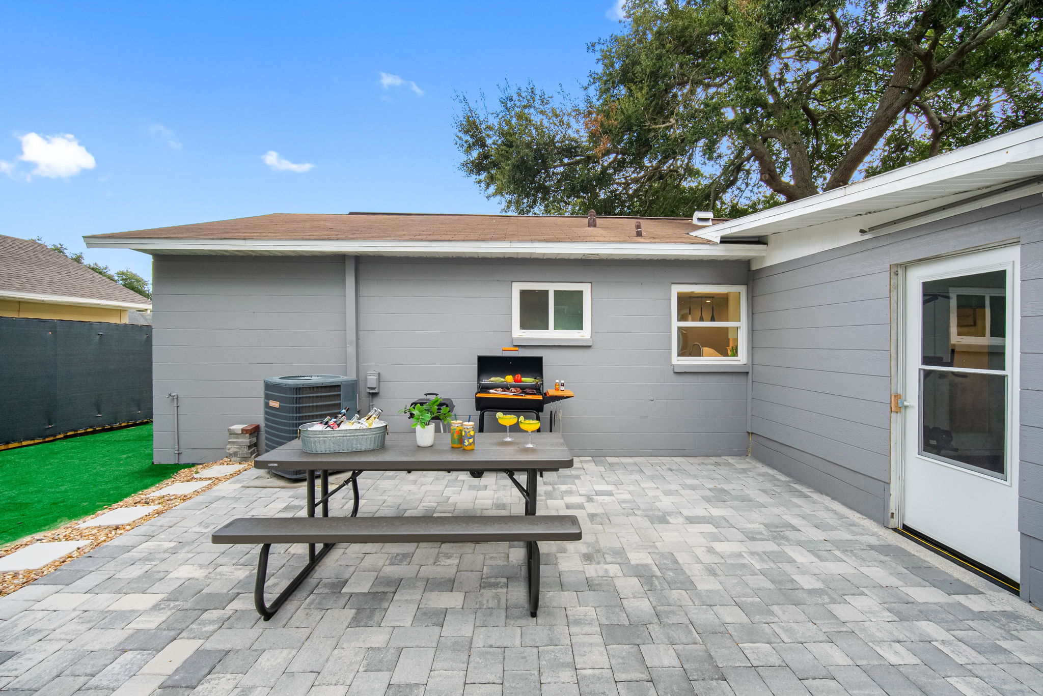 This grill setup with seating is your weekend relaxation station.
