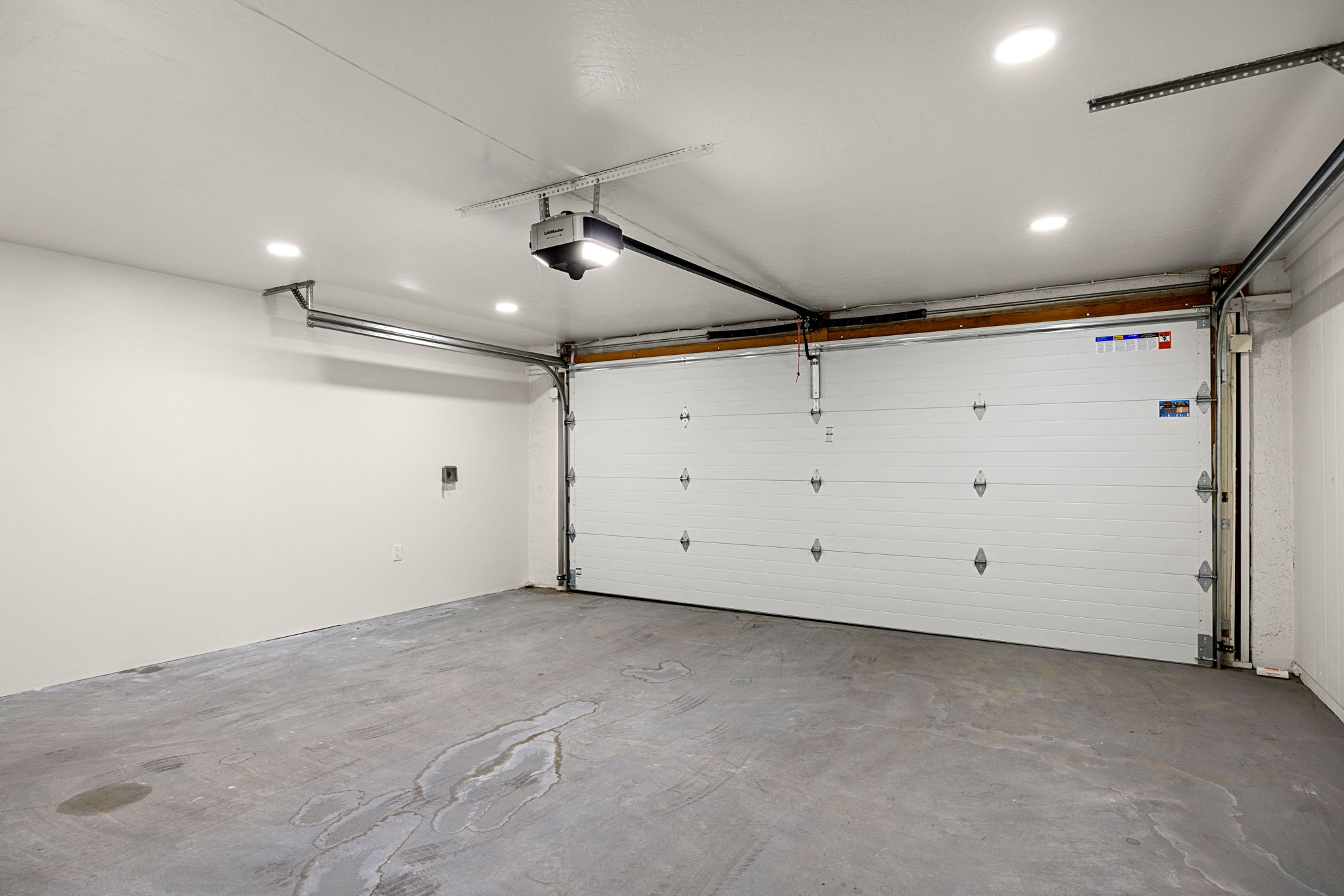In garage parking. Level 2 EV plug can be made available upon request
