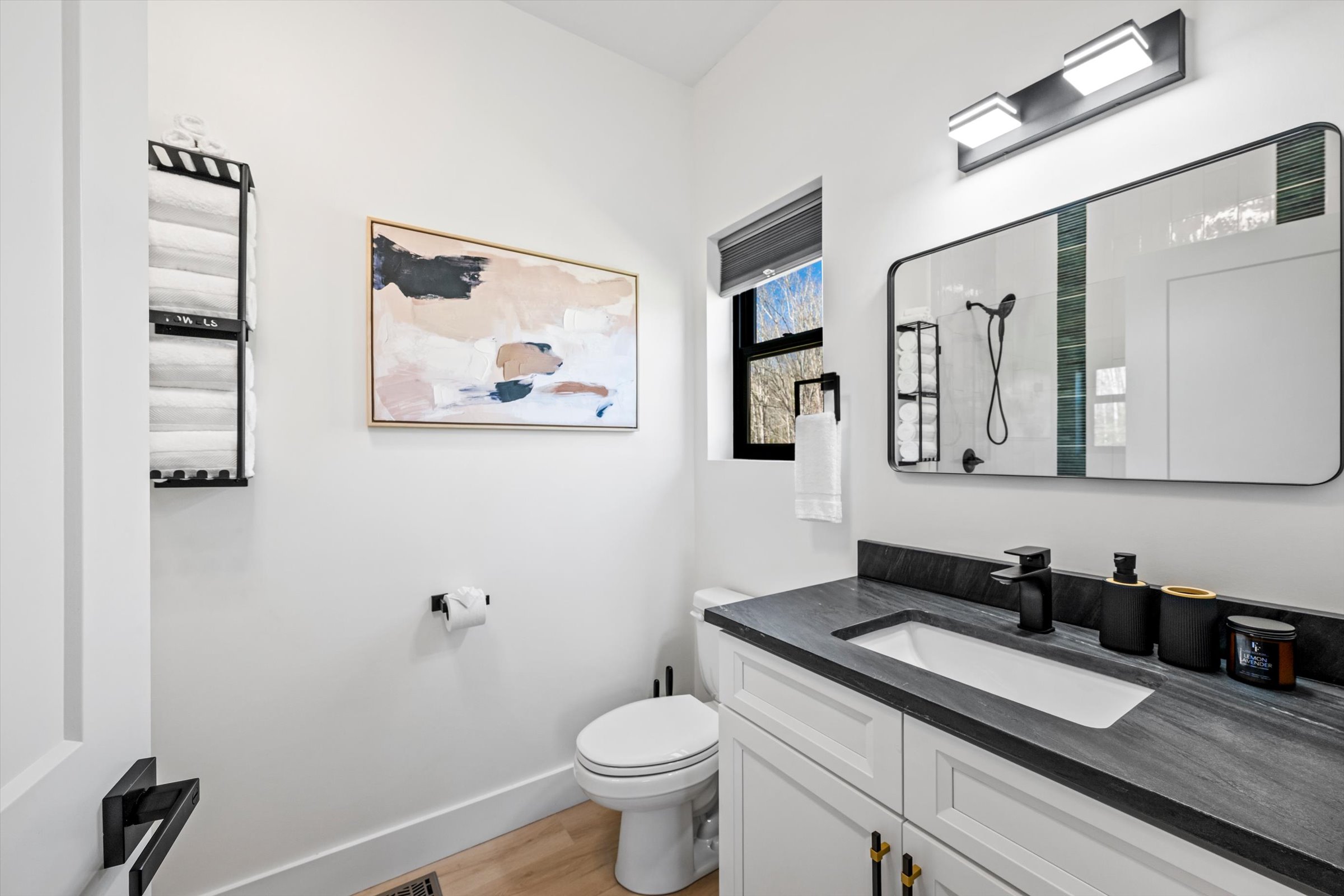 {Ensuite Bathroom}
Start and end the day with ease — clean lines, quartz vanity, and a space that feels bright, simple, and ready when you are.