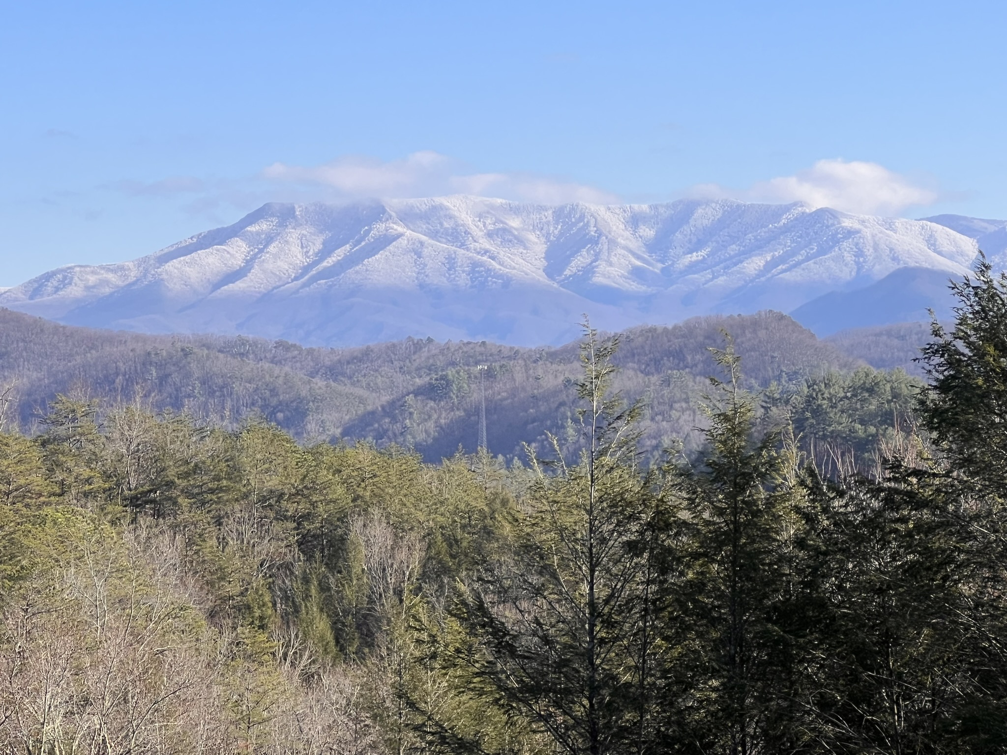 Snow capped mountains make for a magical winter mountain experience.