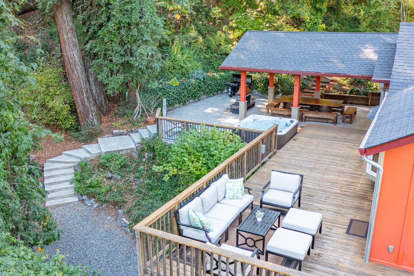 Escape to our cozy deck, surrounded by lush forest views.
