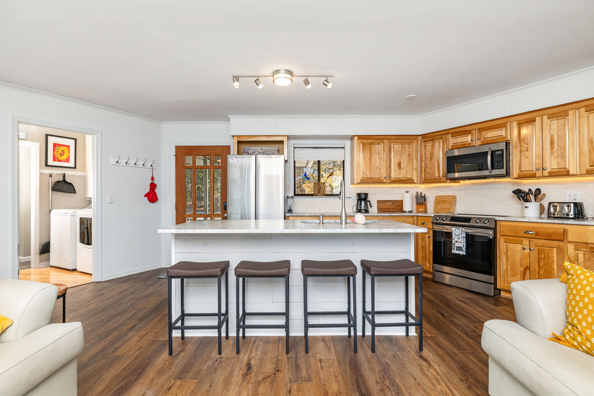 Spacious Kitchen: Whip up culinary delights in style with ample counter space and modern appliances!