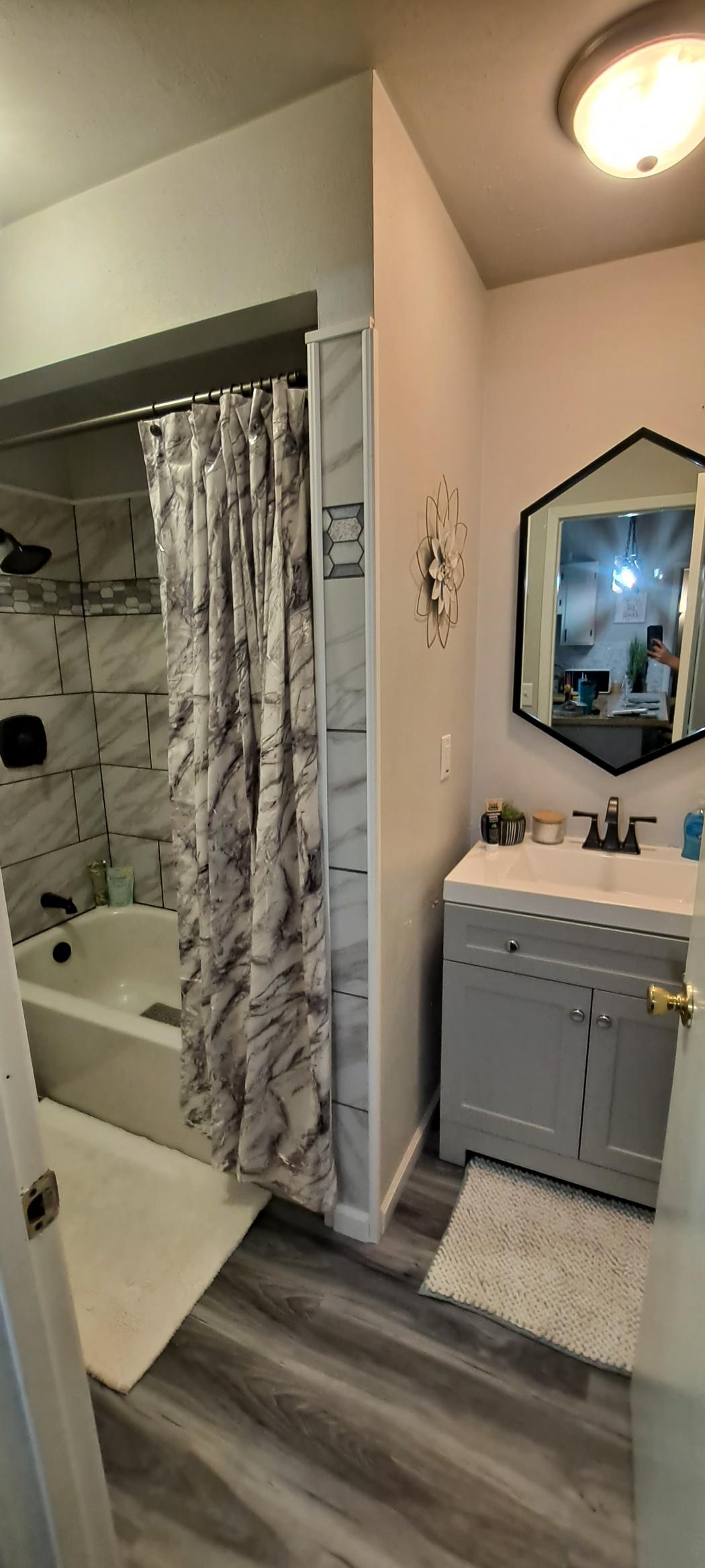 Spa-like bathroom with deluxe amenities and tub