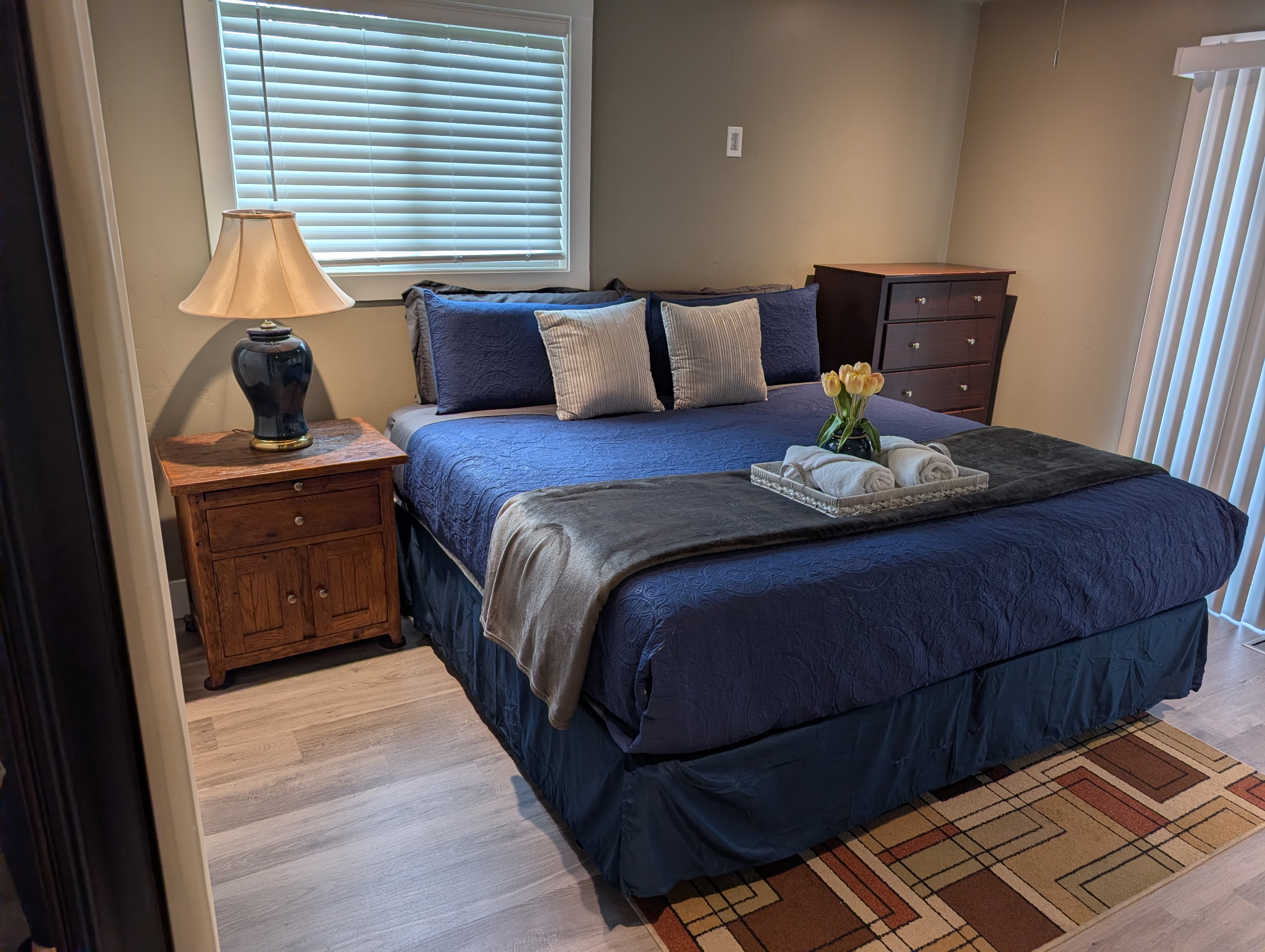 Master Bedroom with king bed with a smart tv