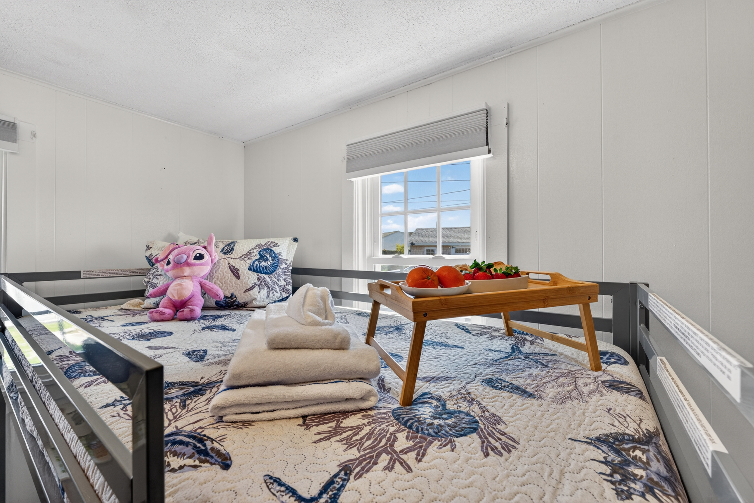 Ideal for kids or groups, the twin bunk beds make this space both playful and practical.