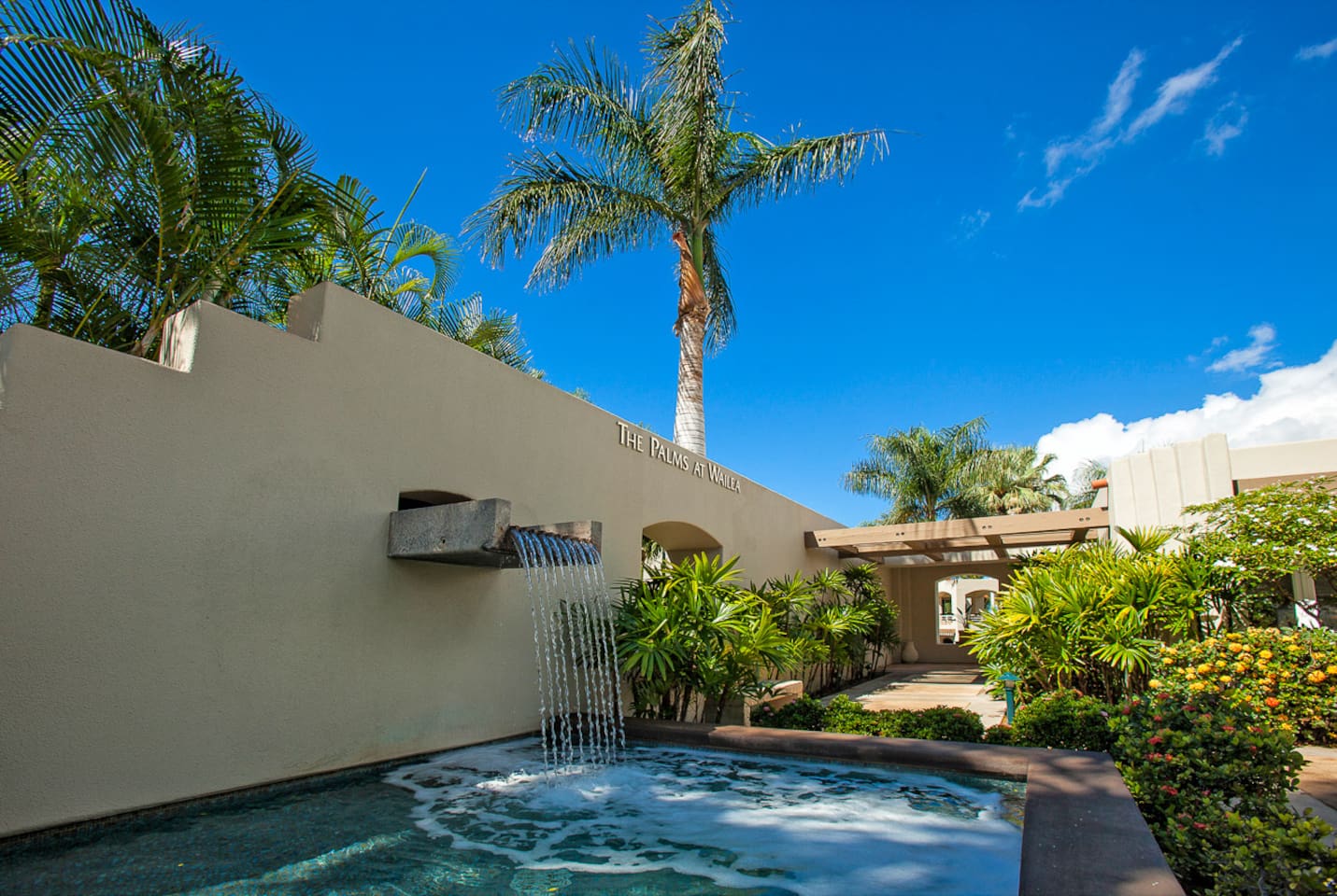 the water feature entering the pool area