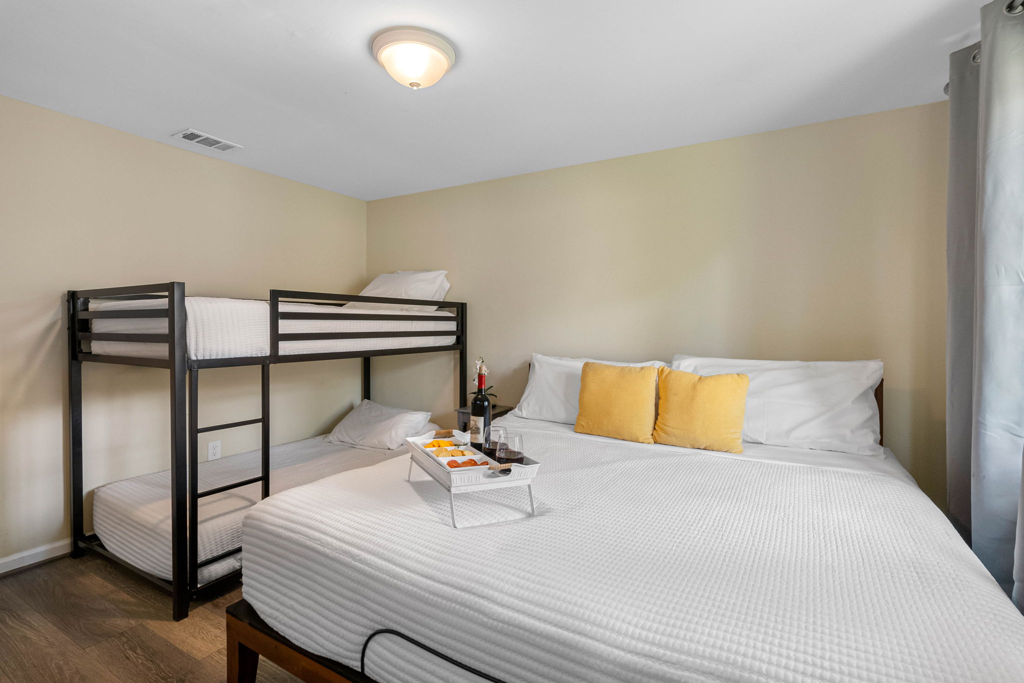 Designed with both comfort and versatility in mind, this beautifully arranged bedroom is perfect for families or groups seeking a restful retreat.