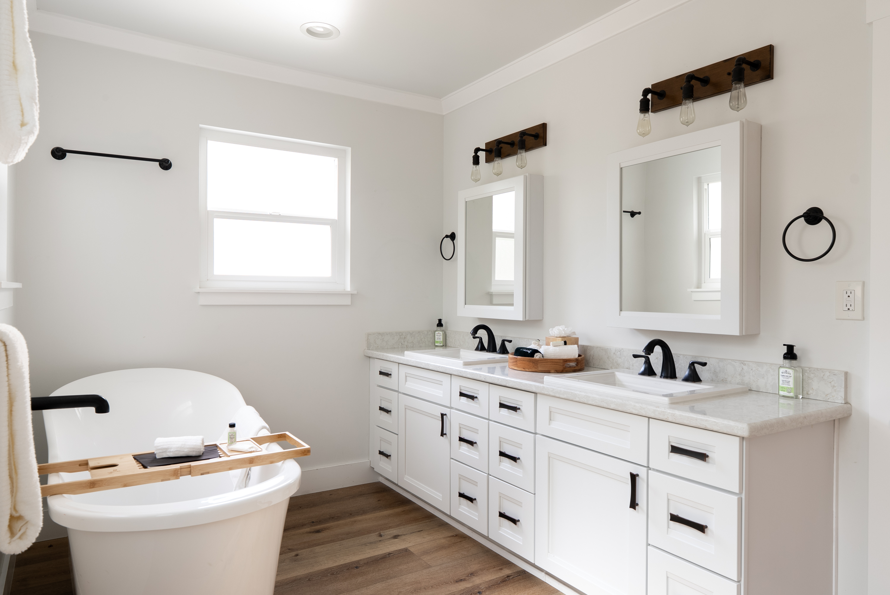 A pristine, serene getaway featuring a soaking tub and thoughtful touches for your comfort.