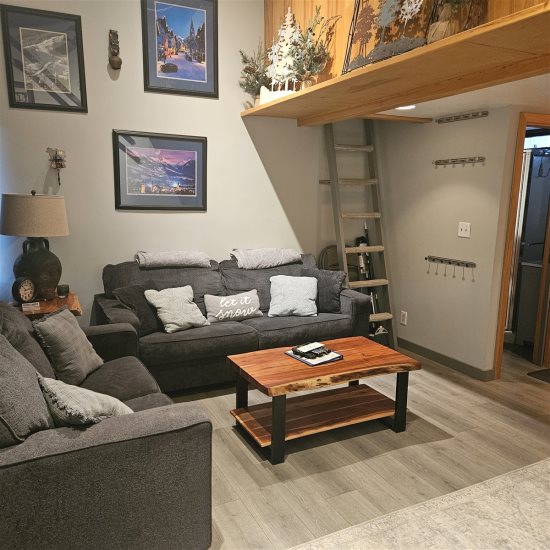 Livingroom area & loft access.