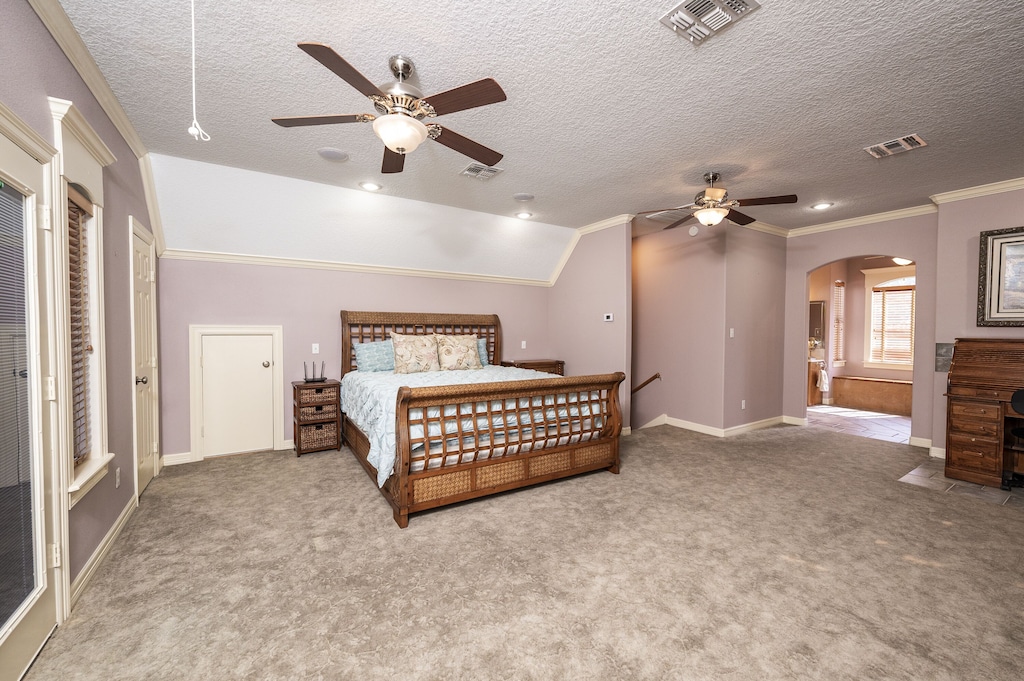 primary bedroom with king bed, en suite bathroom, private balcony and desk