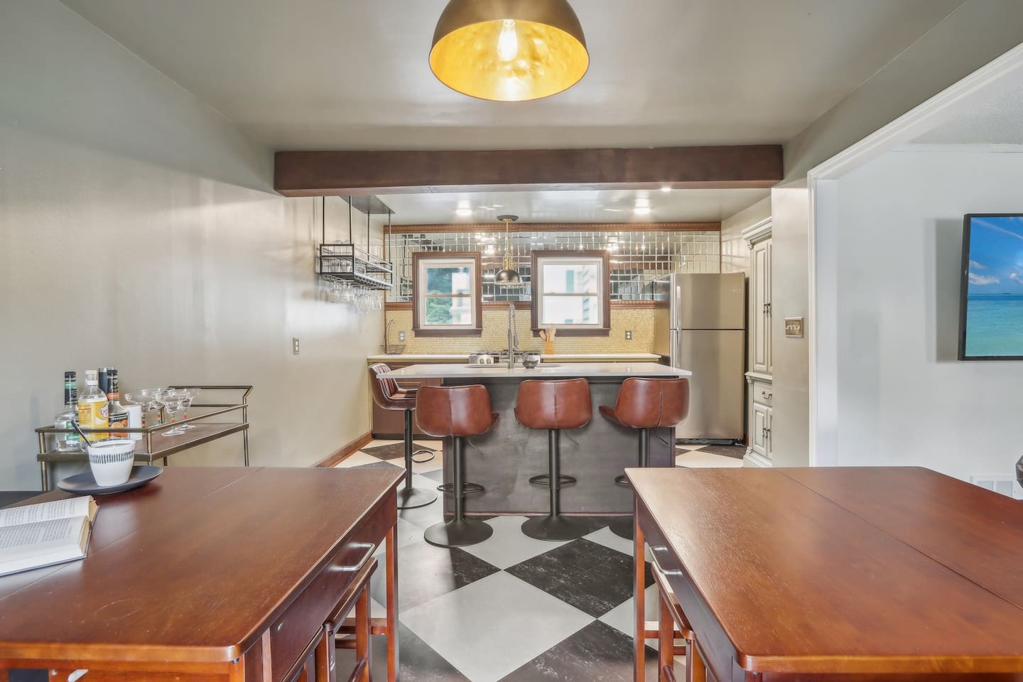 Pull up a stool at the breakfast bar and enjoy coffee, snacks, or a relaxed meal in this inviting kitchen.