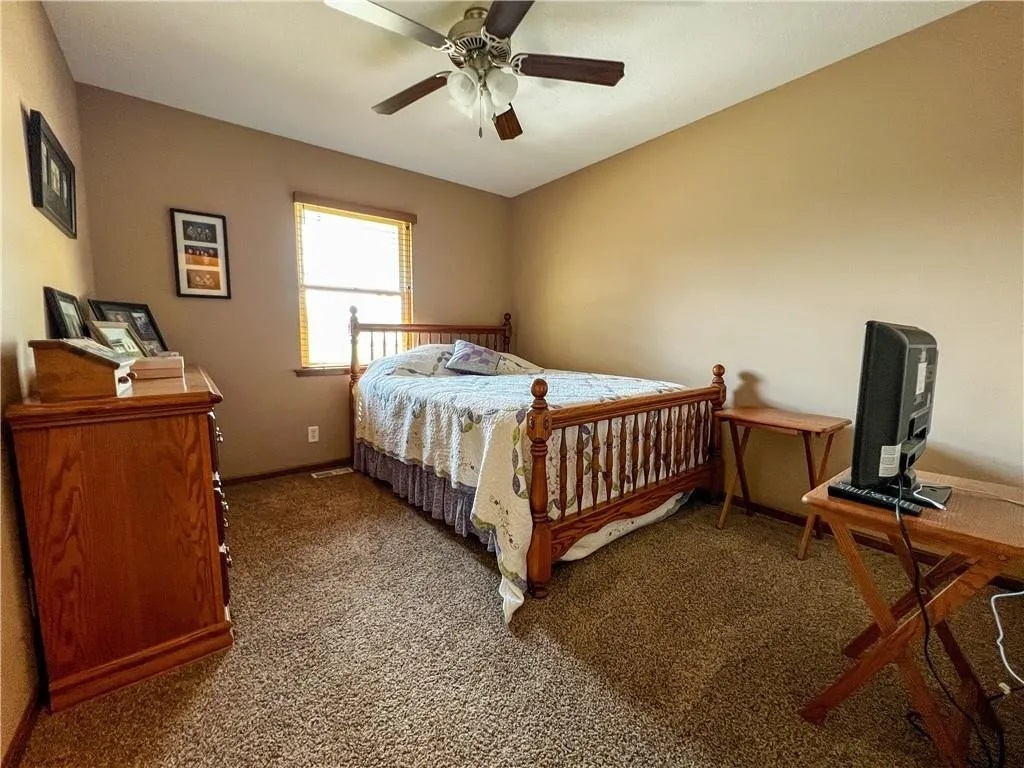 This comfortable bedroom fits right in with the slower pace of farm life, offering a welcoming place to settle in for the night.
