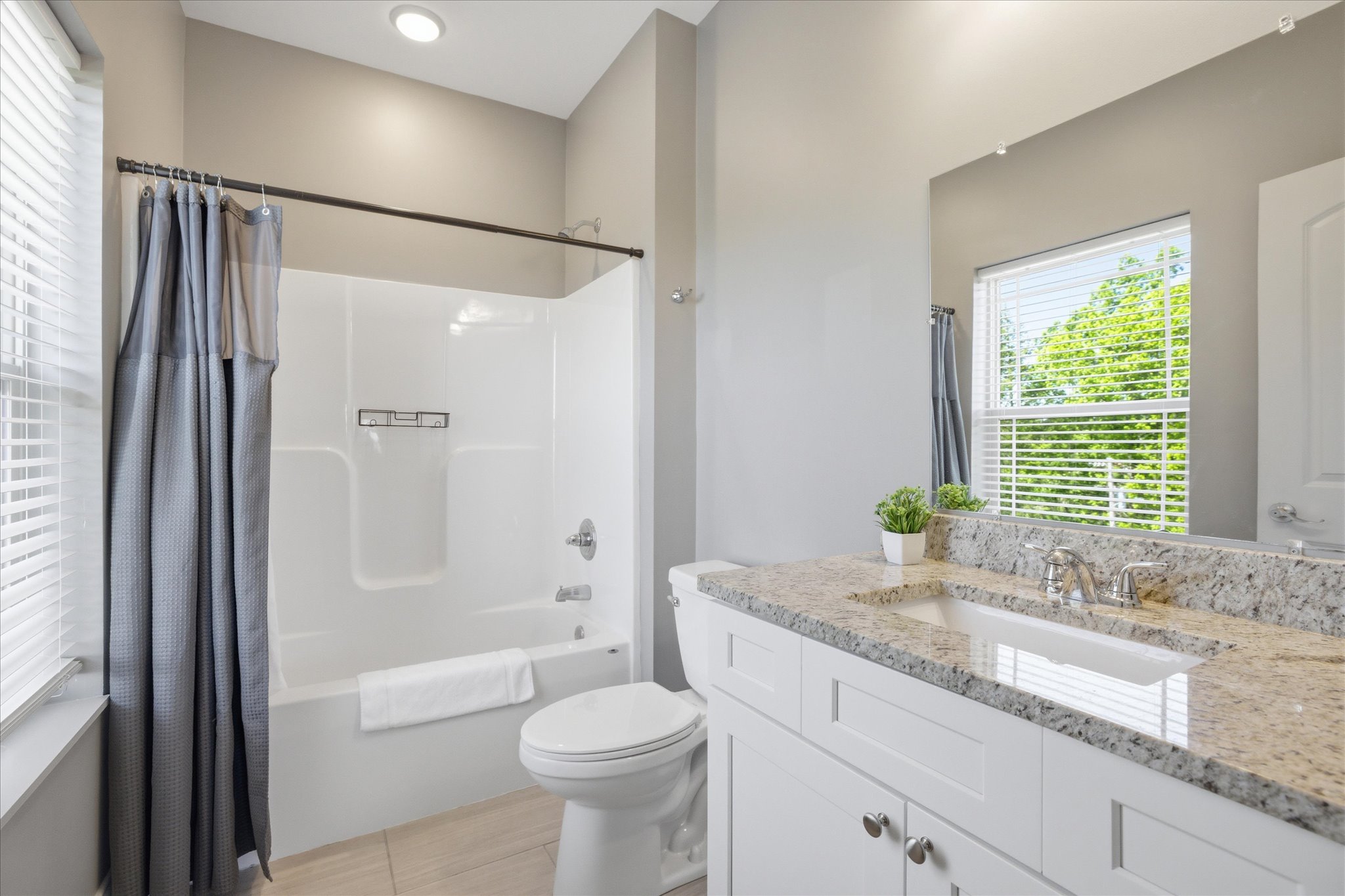 Clean, open, and easy to move through—this master bath gives you space to get ready without the rush, with a layout that keeps everything feeling calm and put together.