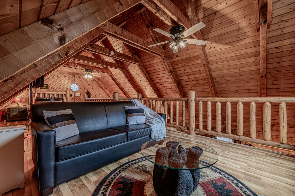Unwind in the spacious loft with vaulted ceilings and rustic charm.