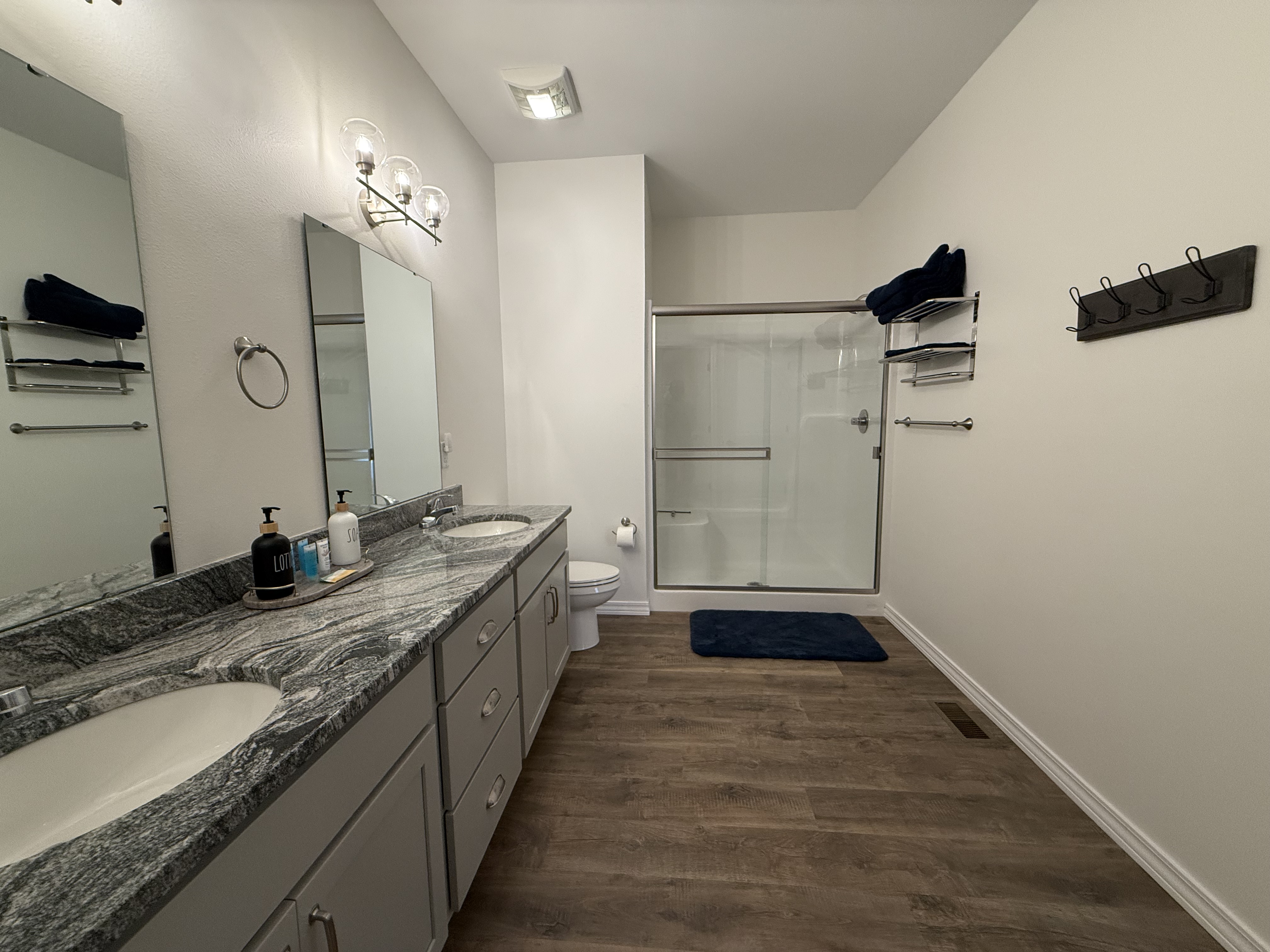Master bedroom en-suite. Shower with glass doors and seat. Double bowls and granite countertop