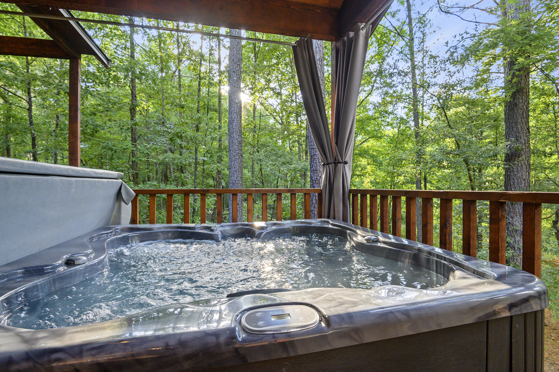 Enjoy the privacy curtains around the hot tub!