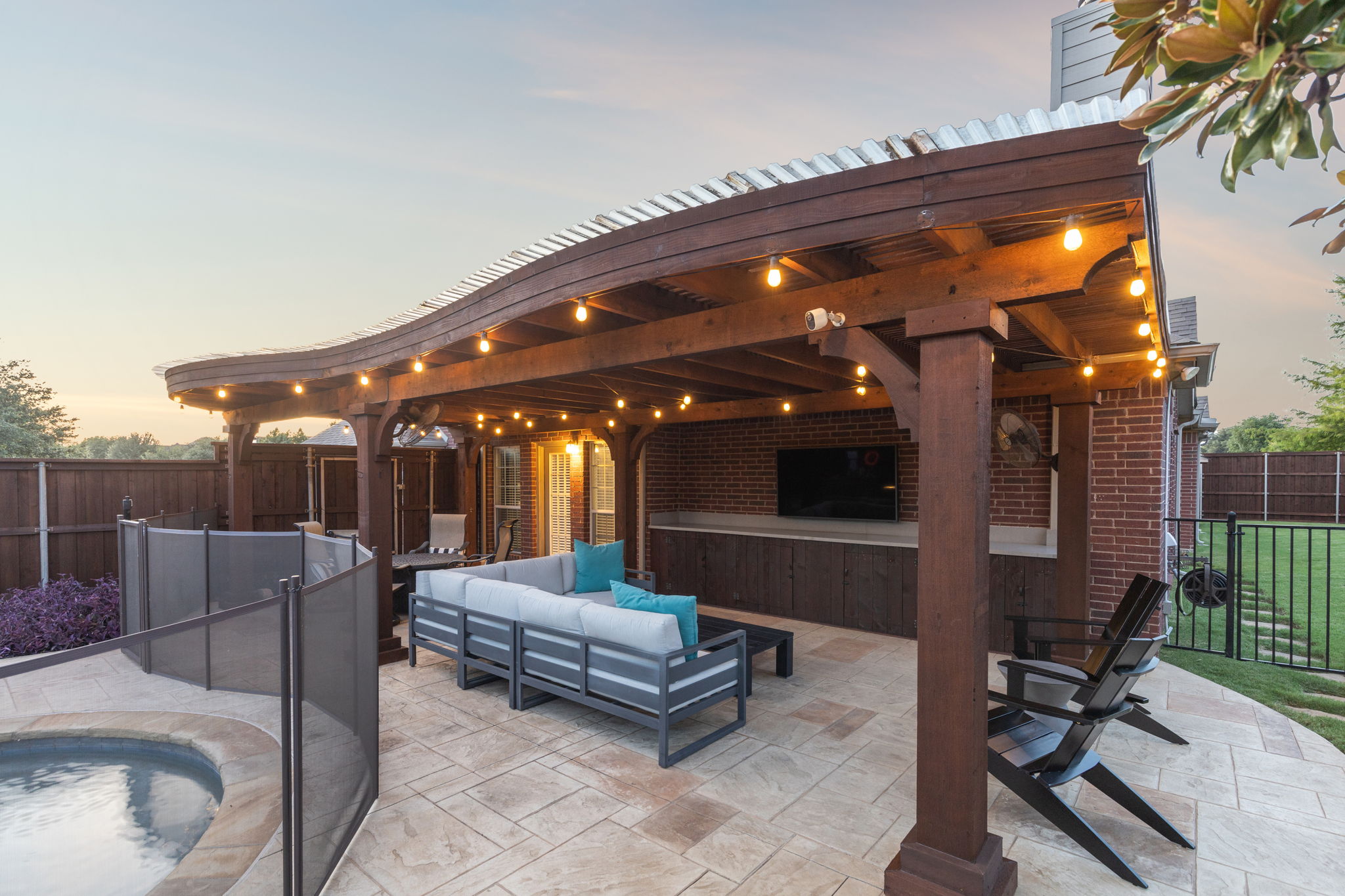 Spacious patio designed for both dining and lounging in style.