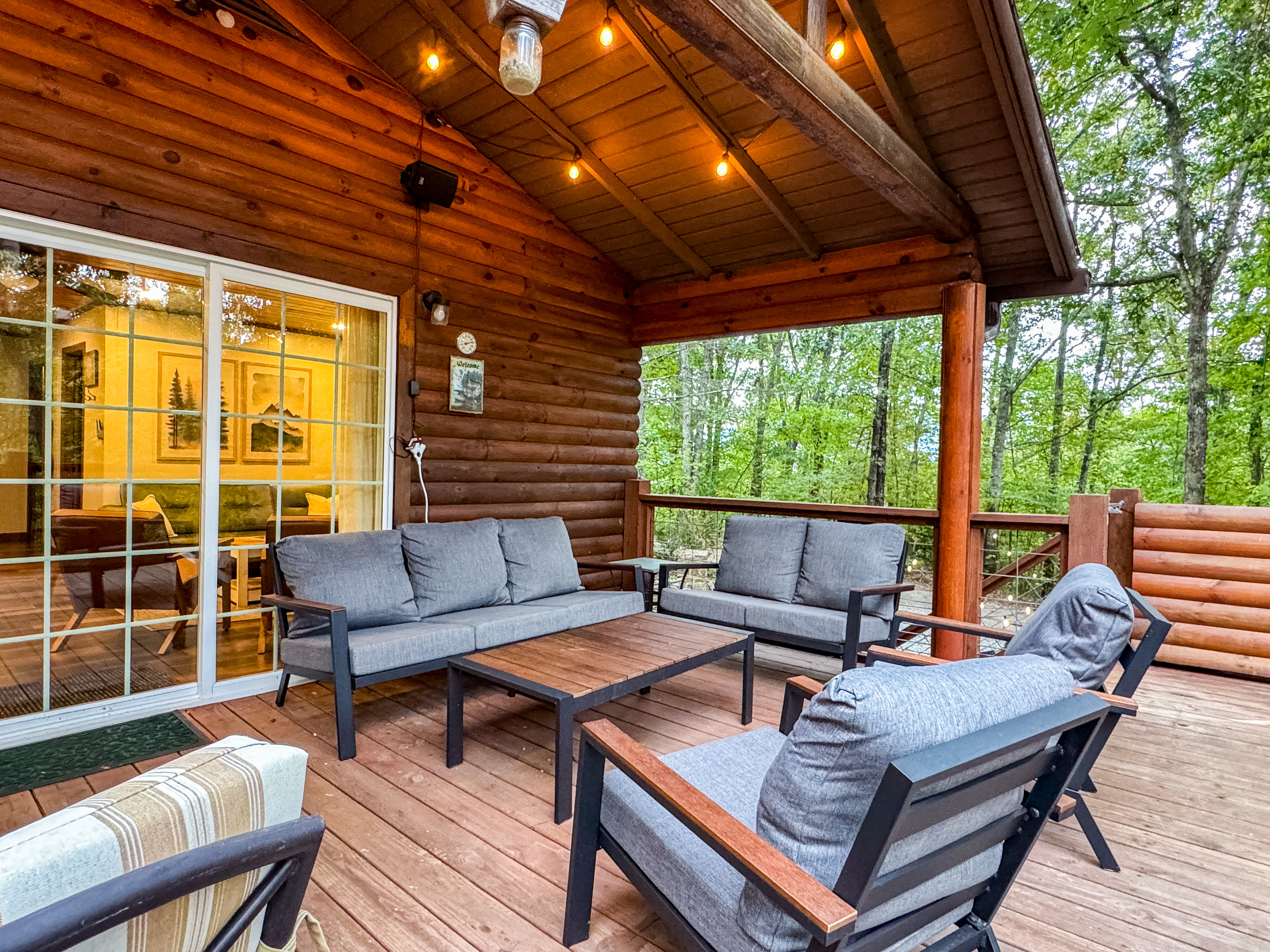 Our covered deck features plenty of comfy seating - perfect for coffee in the morning listening to the birds as the mountain fog burns away.