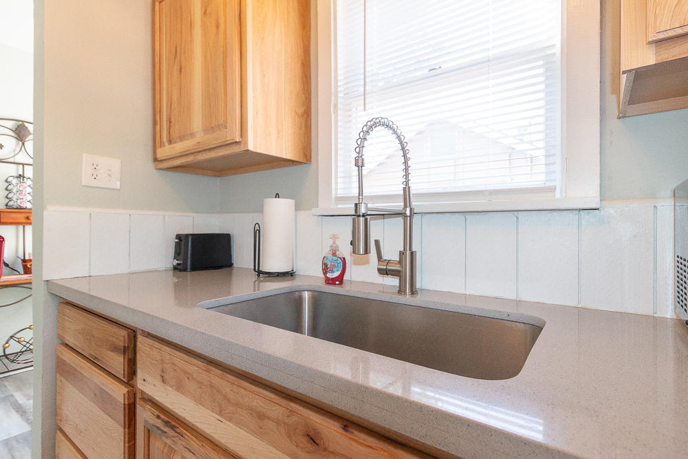 Modern finishes, natural light, and all the essentials make cooking a breeze.