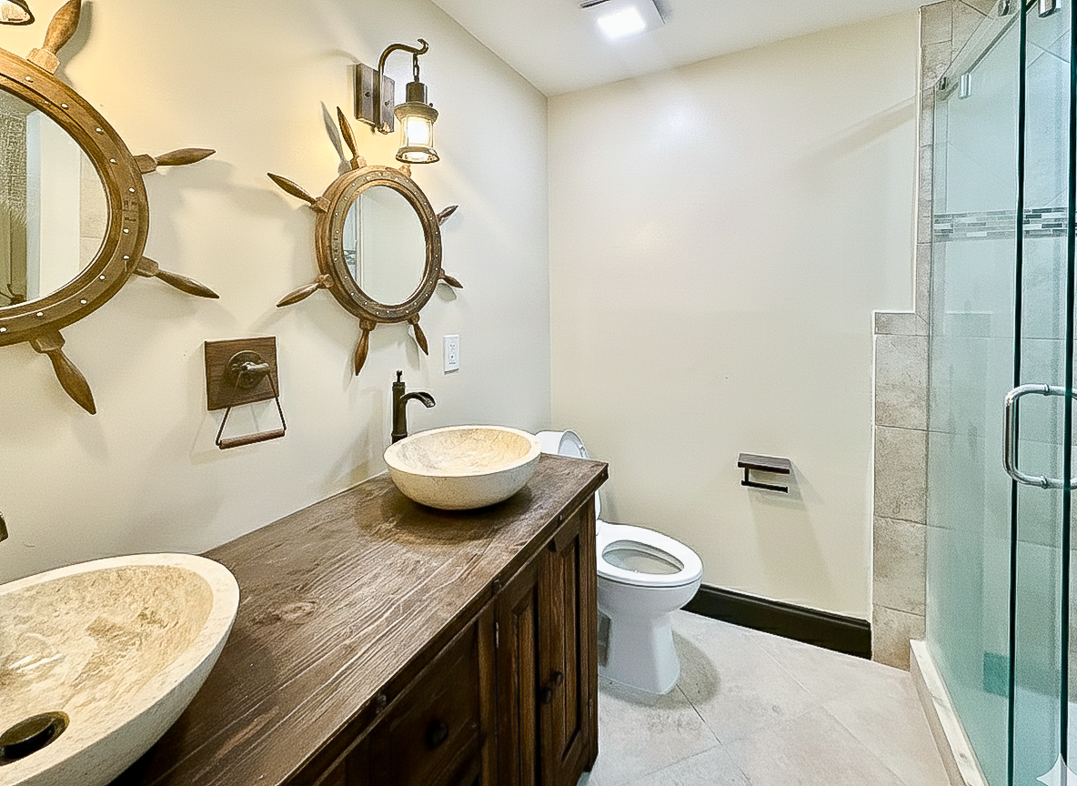 Dual vanities for mates to scrub up side‑by‑side, and a sturdy shower to rinse away the salt of the day. A proper station for the crew to keep fresh before the next adventure.