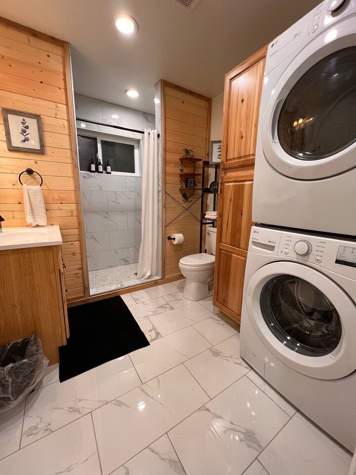 This bathroom, also on the 2nd floor includes a laundry area.   In fact,  there are laundry areas in each of the separate sleeping areas for your convenience.   Laundry soap, and dryer sheets are provided.   
