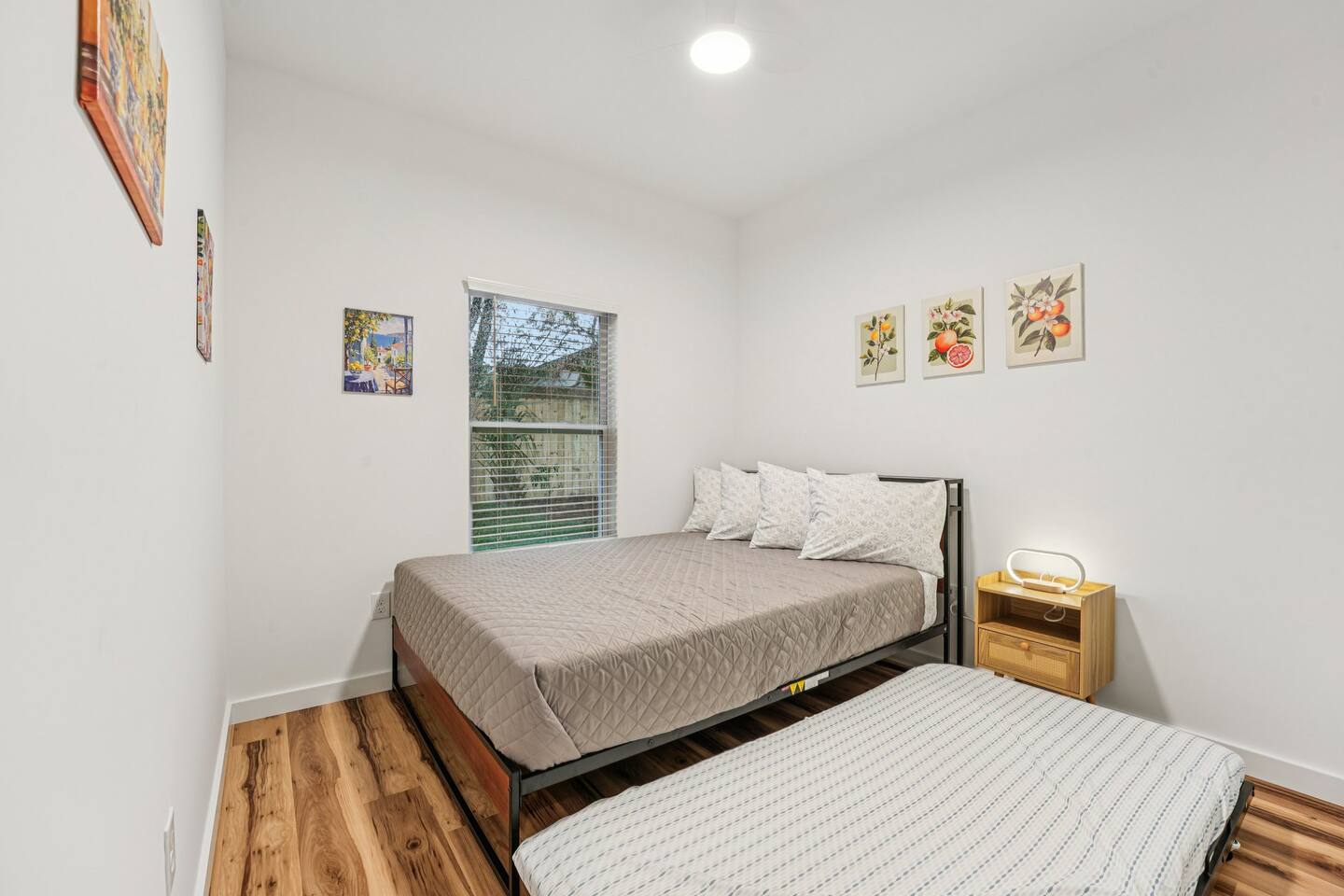 2nd bedroom has a Queen size bed, with a twin size trundle available underneath with extra blanket and pillow in the closet.