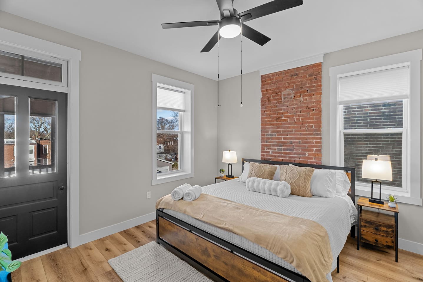Master suite with King size bed and walk-in closet.  Small balcony off of Master Bedroom overlooking back yard.
