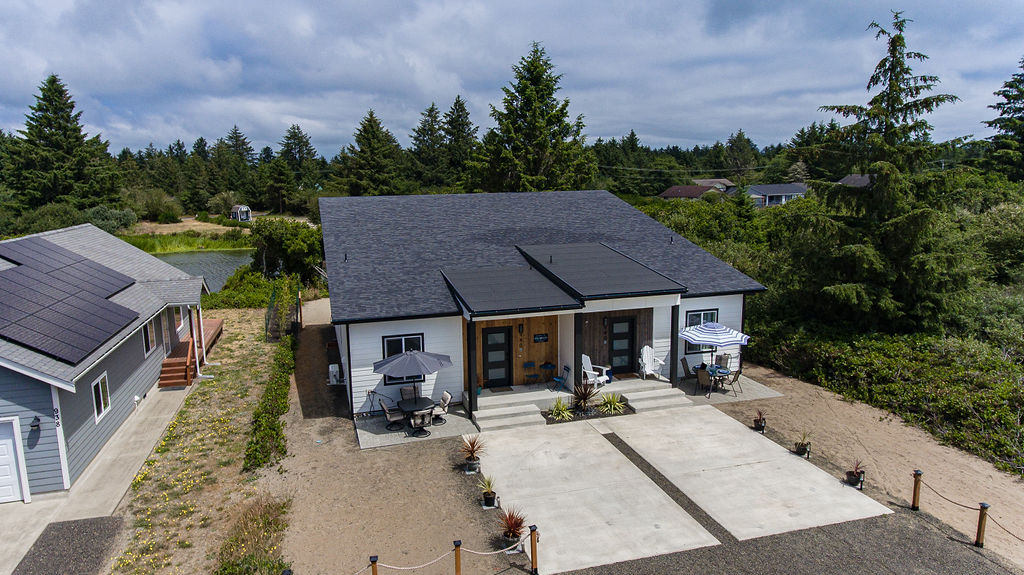 Two front doors, one canal-front address — pick a side or book them both as Twin Shores.