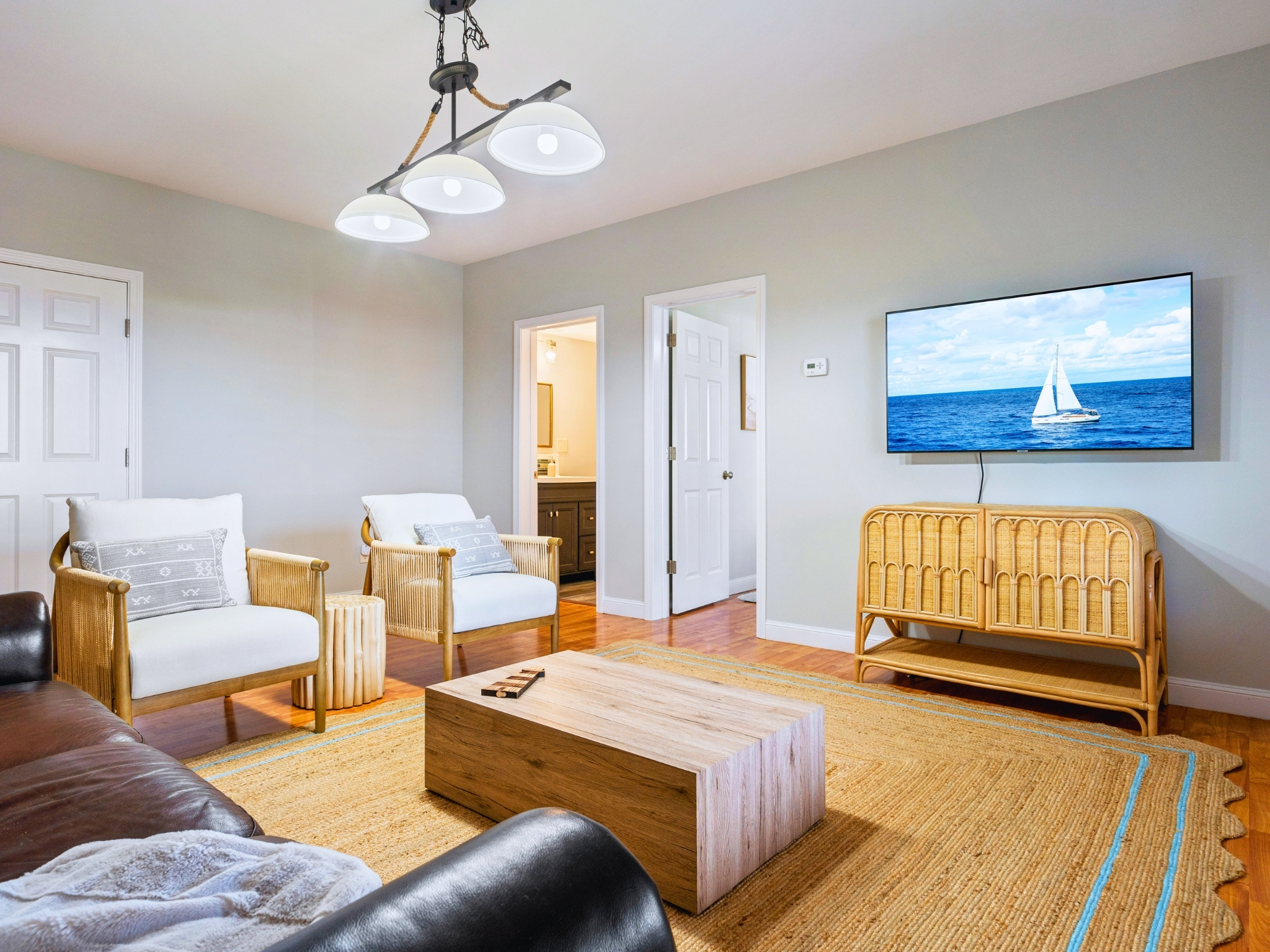 Here’s our basement living room—ideal for movie nights, chatting with loved ones, or just kicking back and enjoying the space!