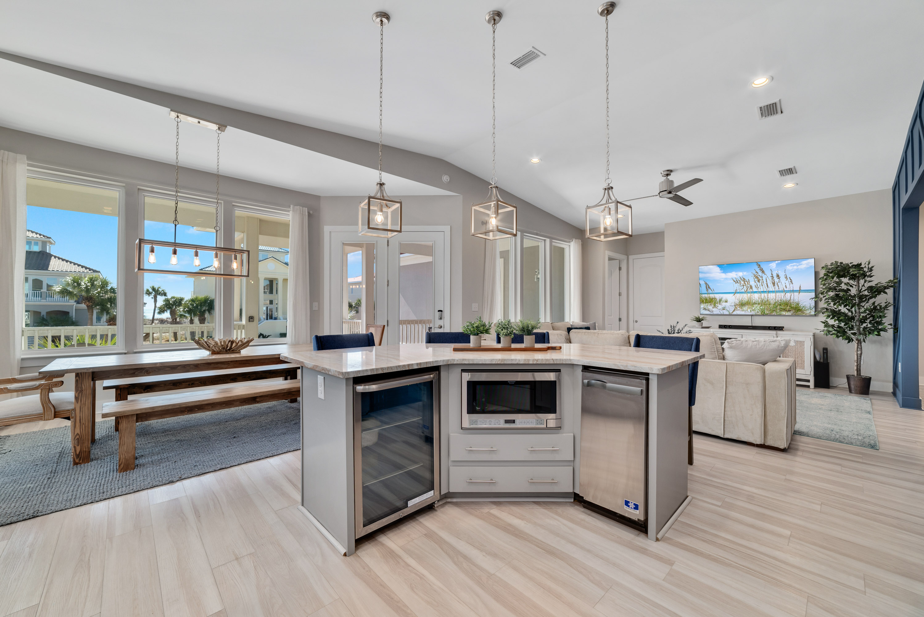 Ultimate Convenience: A Kitchen Island Oasis with Microwave, Ice Maker &amp; Beverage Cooler!