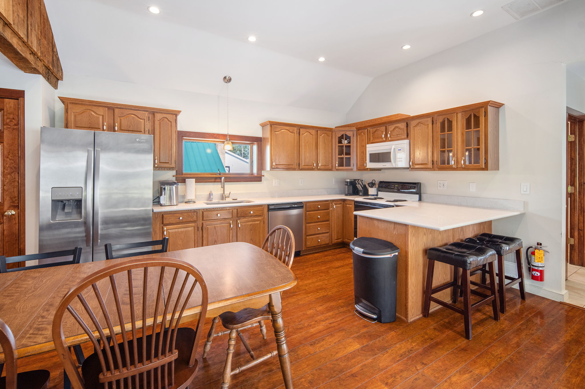 Prepare meals with ease in the kitchen, complete with breakfast bar seating.
