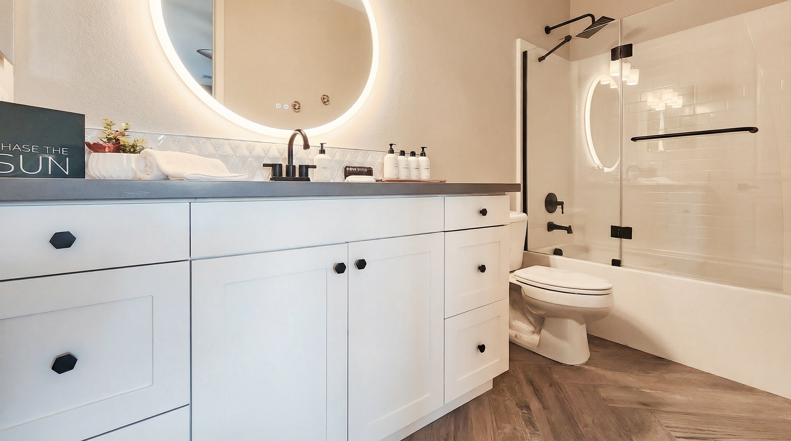 Ensuite bathroom #2 with bathtub / shower combo.