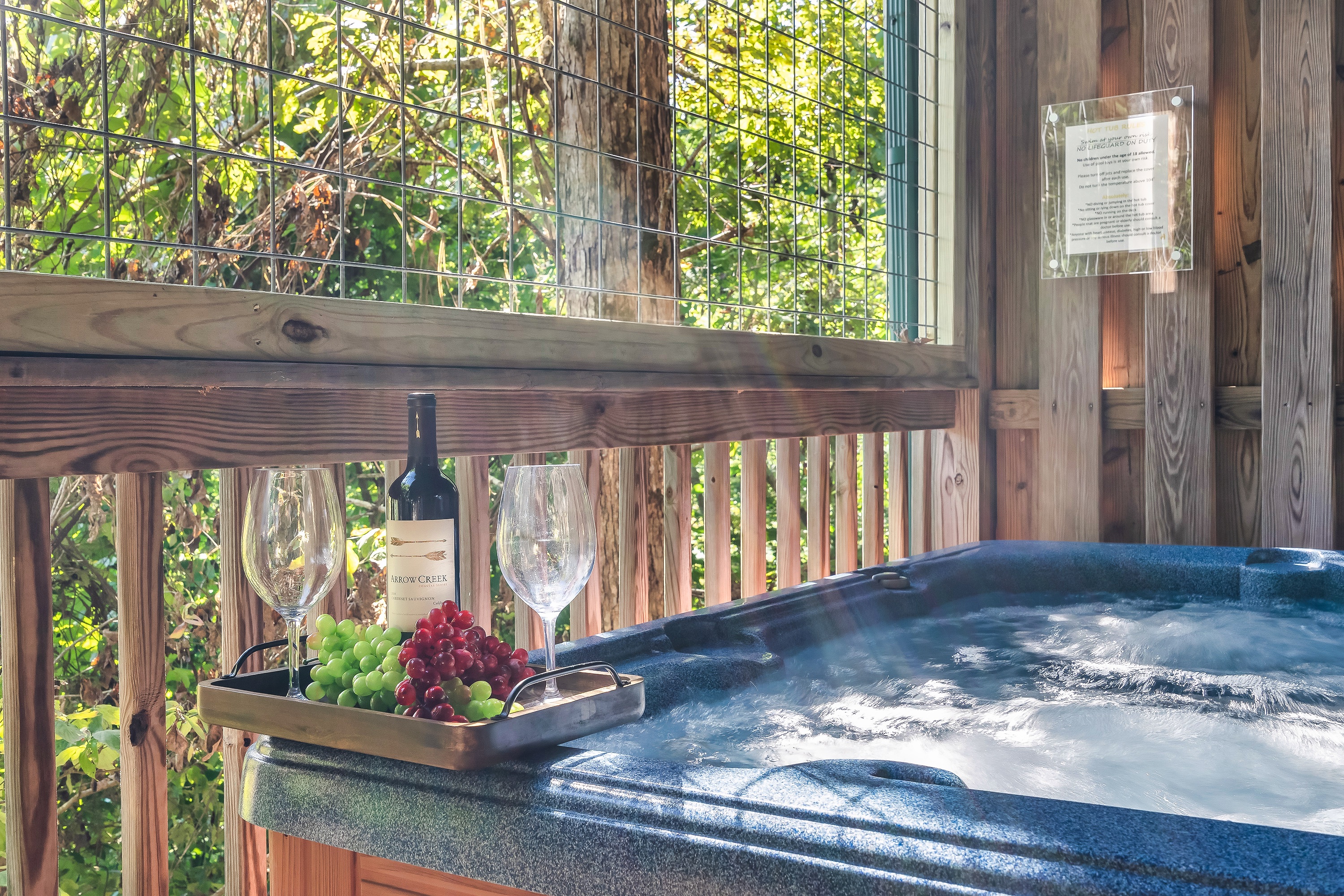 Cozy up for the evening in our private hot tub! 

(Wine and grapes not included. Please, no glass in the hot tub!)