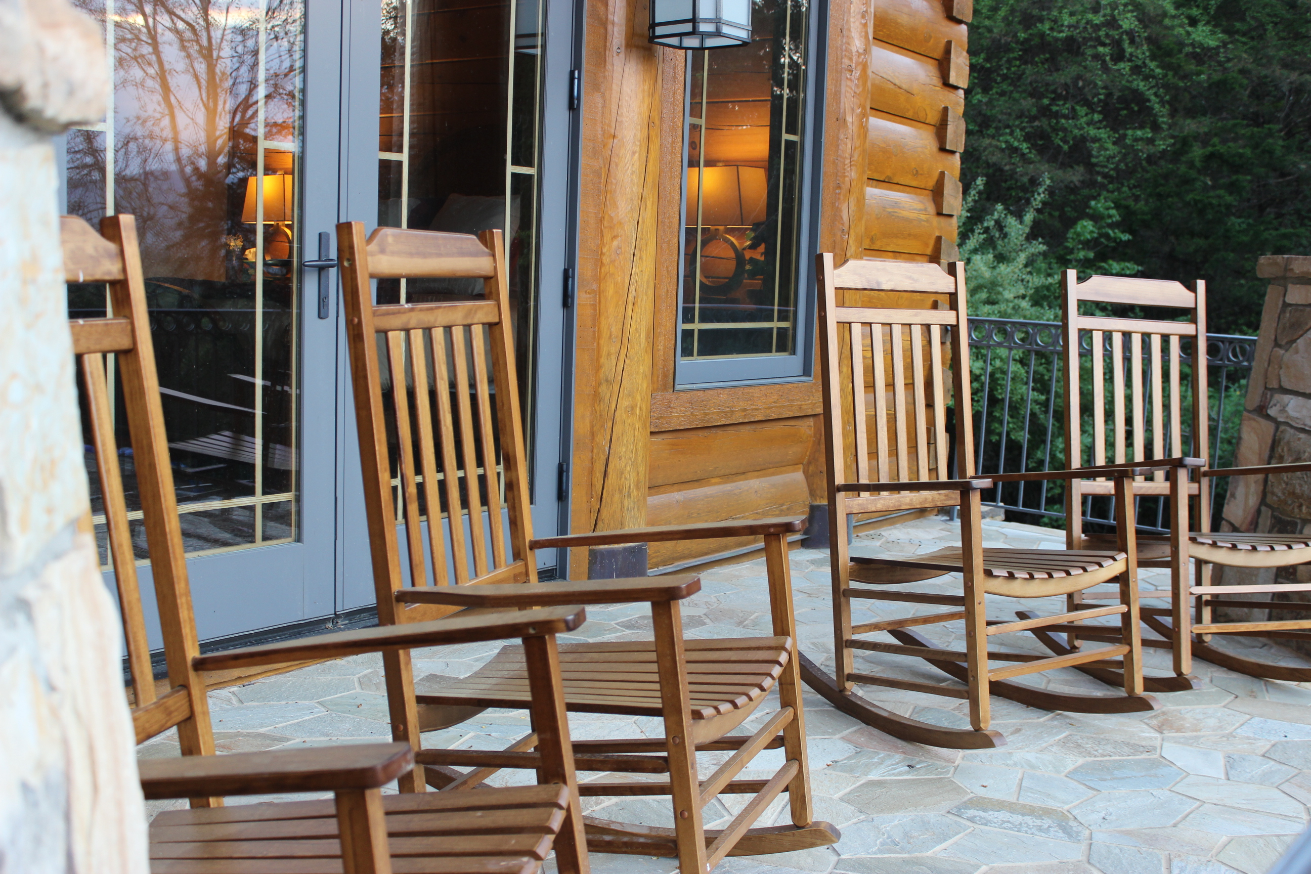 Enjoy your morning cup of coffee while rocking on the patio and being surrounded by nature