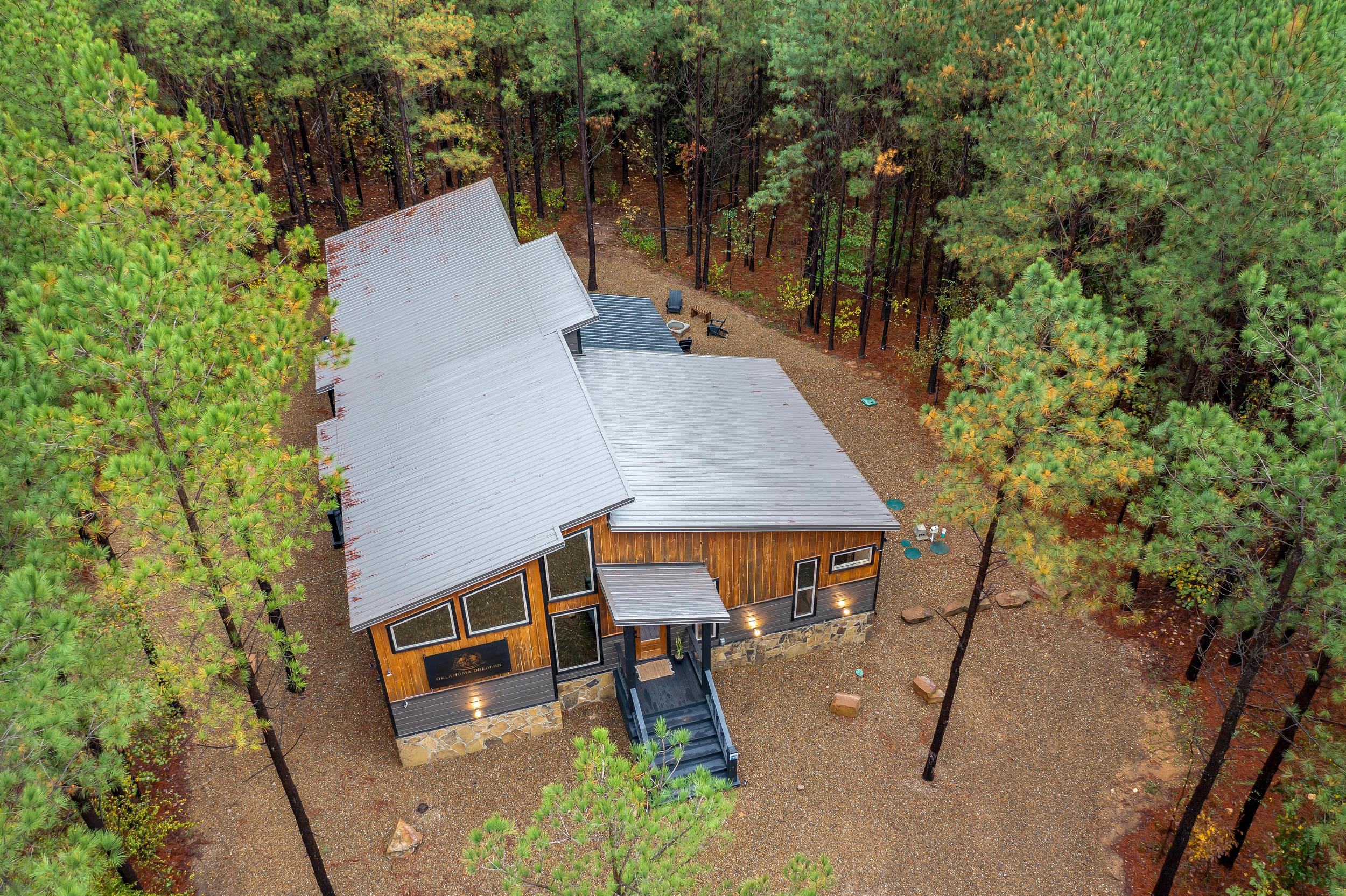 Horseshoes on the left side of the property, fire pit and swings on the righ